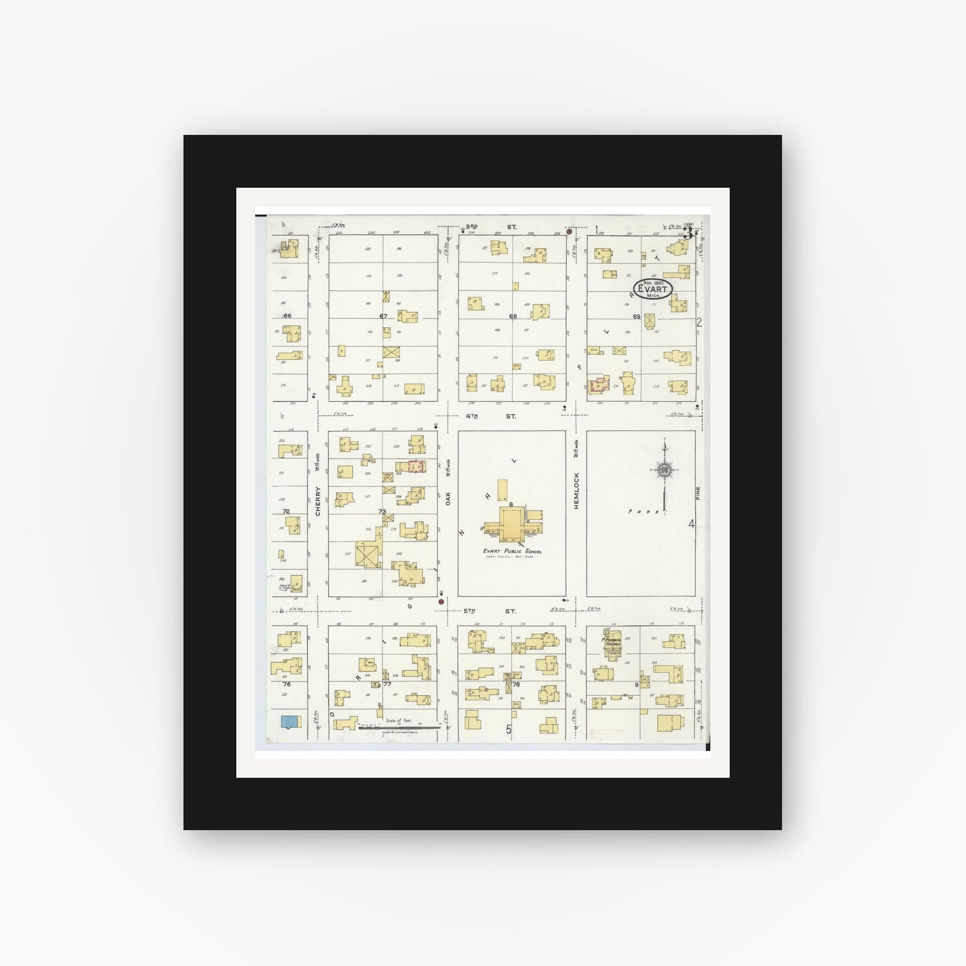 Old map wall art mockup — black gallery frame with white mat — Sanborn Fire Insurance Map from Evart, Osceola County, Michigan (1920), Sheet #0003