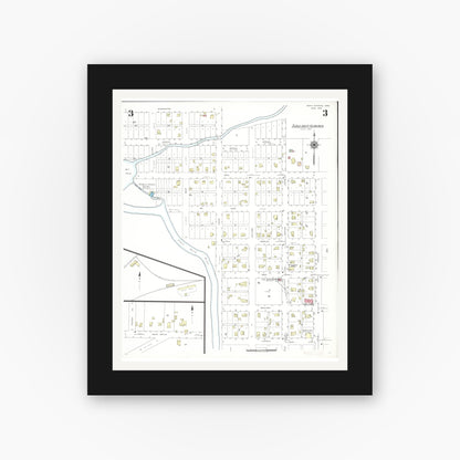 Old map wall art mockup — black gallery frame with white mat — Sanborn Fire Insurance Map from Nora Springs, Floyd County, Iowa (1942), Sheet #0003