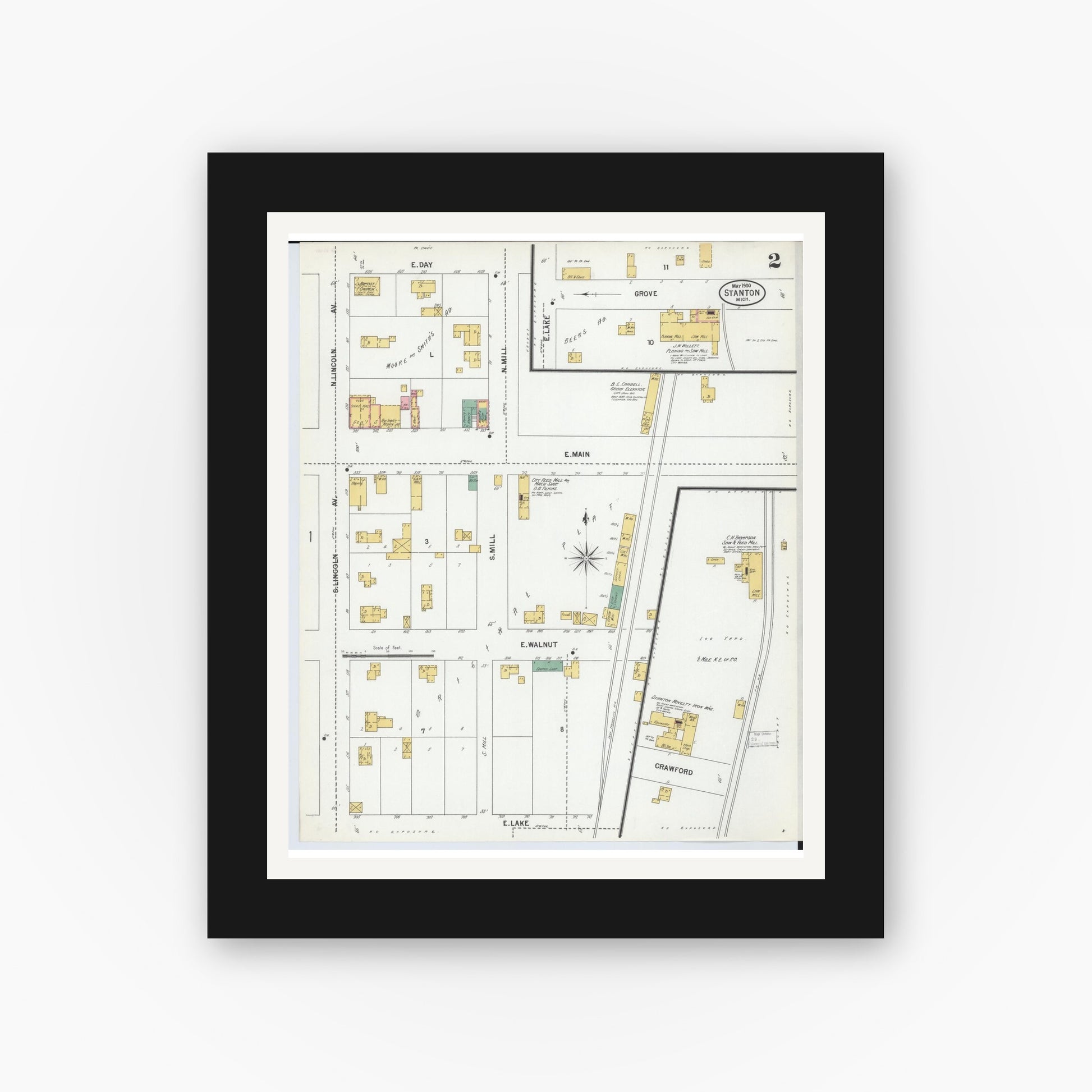 Old map wall art mockup — black gallery frame with white mat — Sanborn Fire Insurance Map from Stanton, Montcalm County, Michigan (1900), Sheet #0002