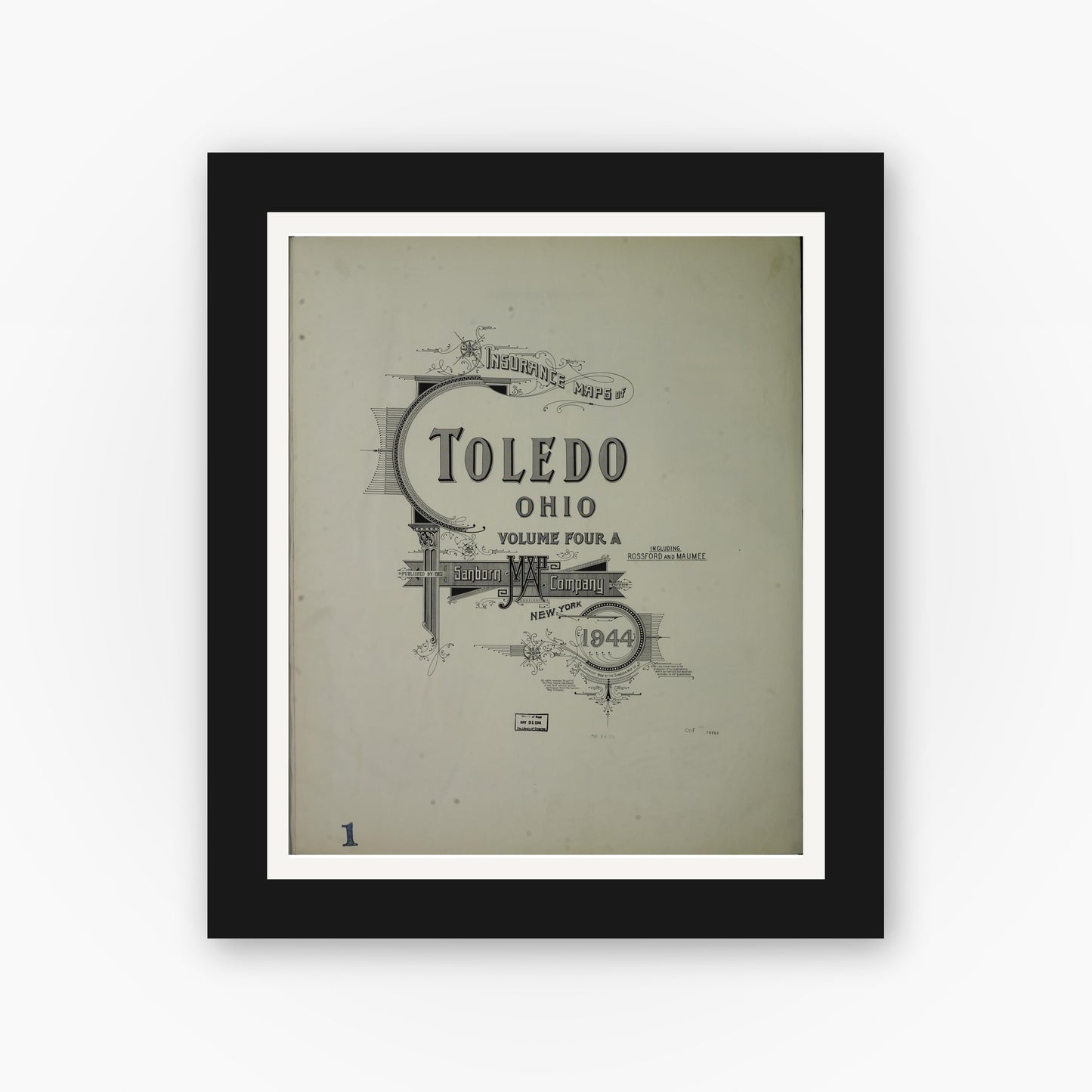 Old map wall art mockup — black gallery frame with white mat — Sanborn Fire Insurance Map from Toledo, Lucas County, Ohio (1944), Sheet #0001