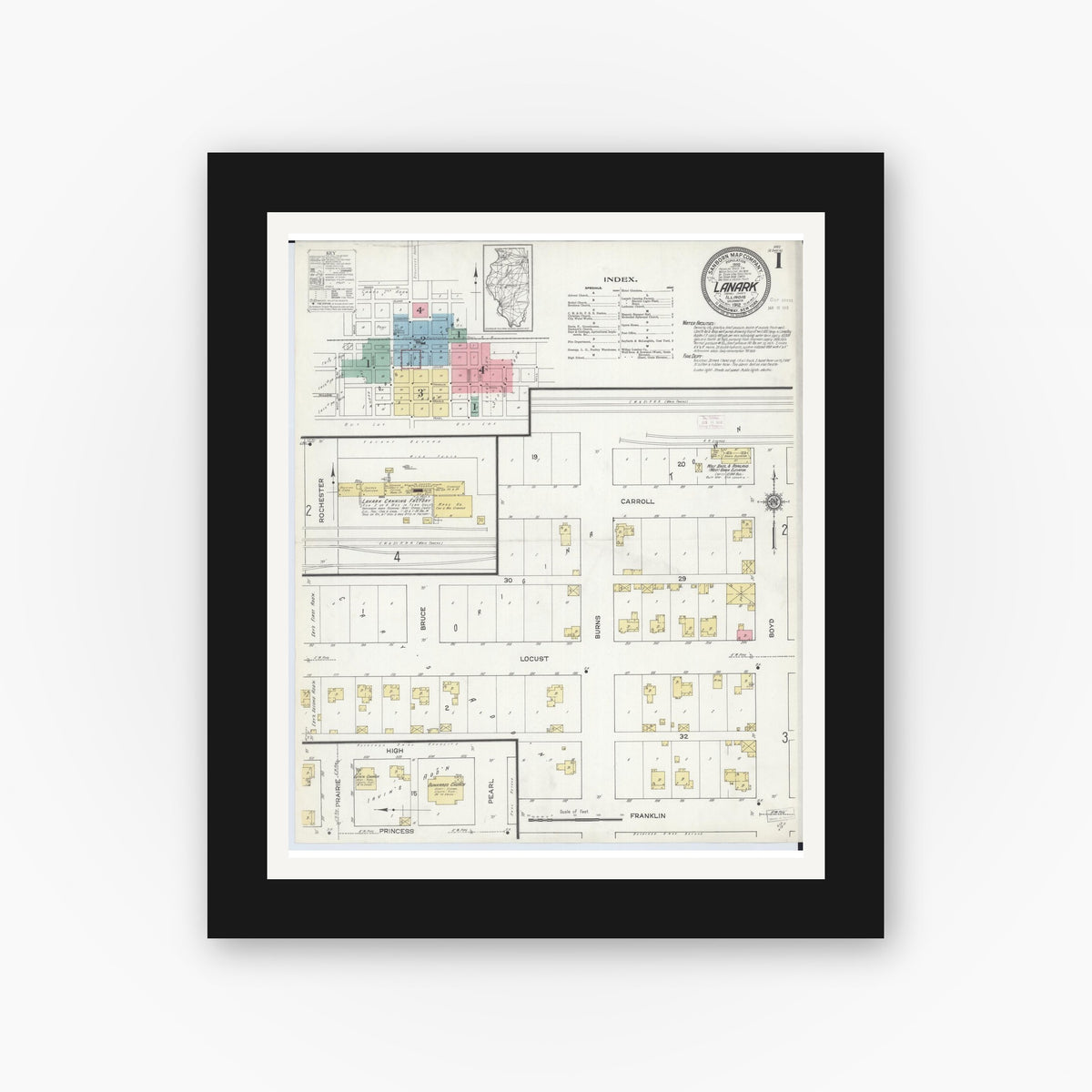 Old map wall art mockup — black gallery frame with white mat — Sanborn Fire Insurance Map from Lanark, Carroll County, Illinois (1912), Sheet #0001