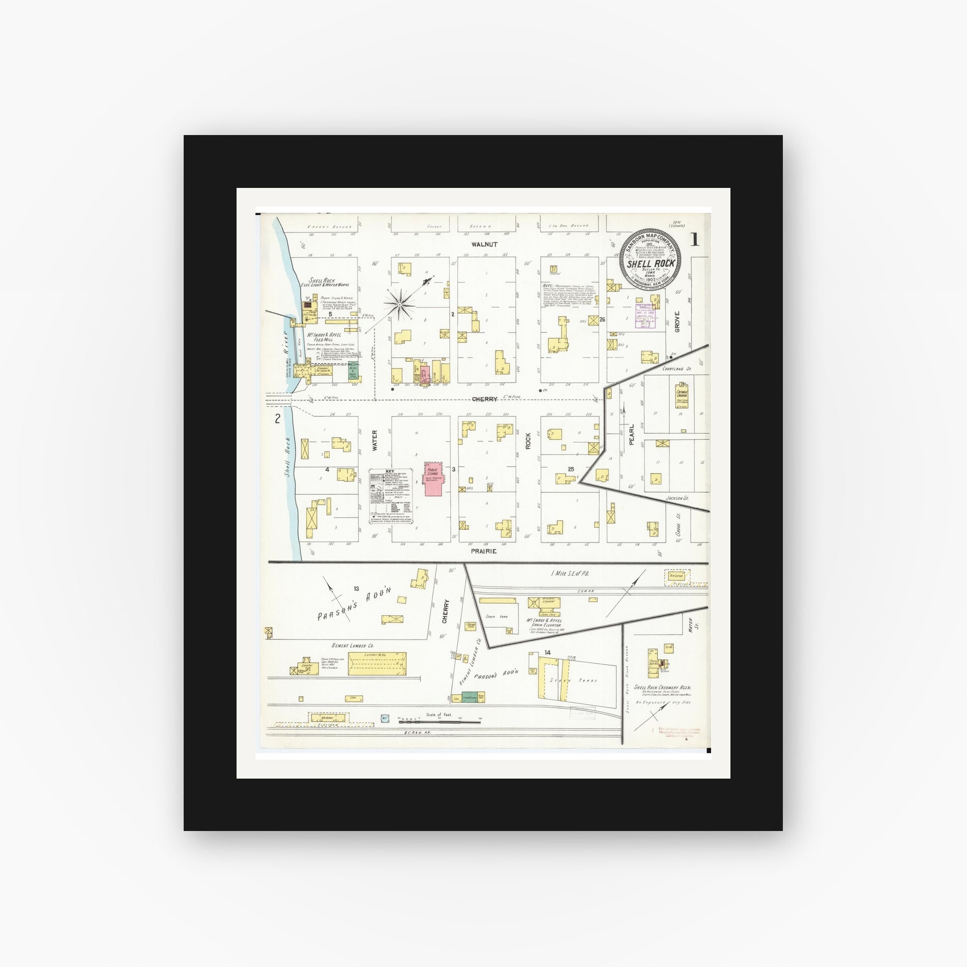Old map wall art mockup — black gallery frame with white mat — Sanborn Fire Insurance Map from Shell Rock, Butler County, Iowa (1902), Sheet #0001