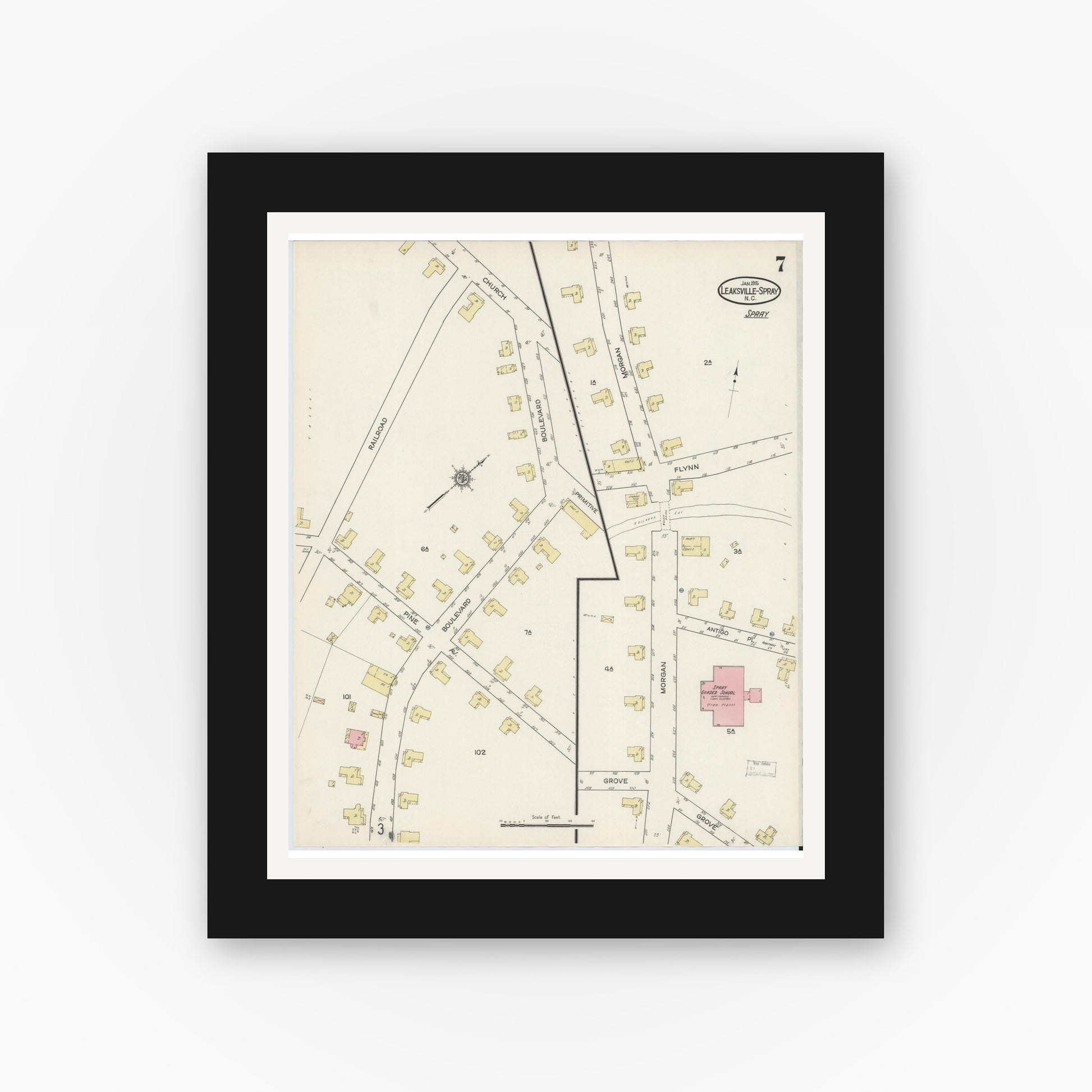 Old map wall art mockup — black gallery frame with white mat — Sanborn Fire Insurance Map from Leaksville-spray, Rockingham County, North Carolina (1915), Sheet #0007