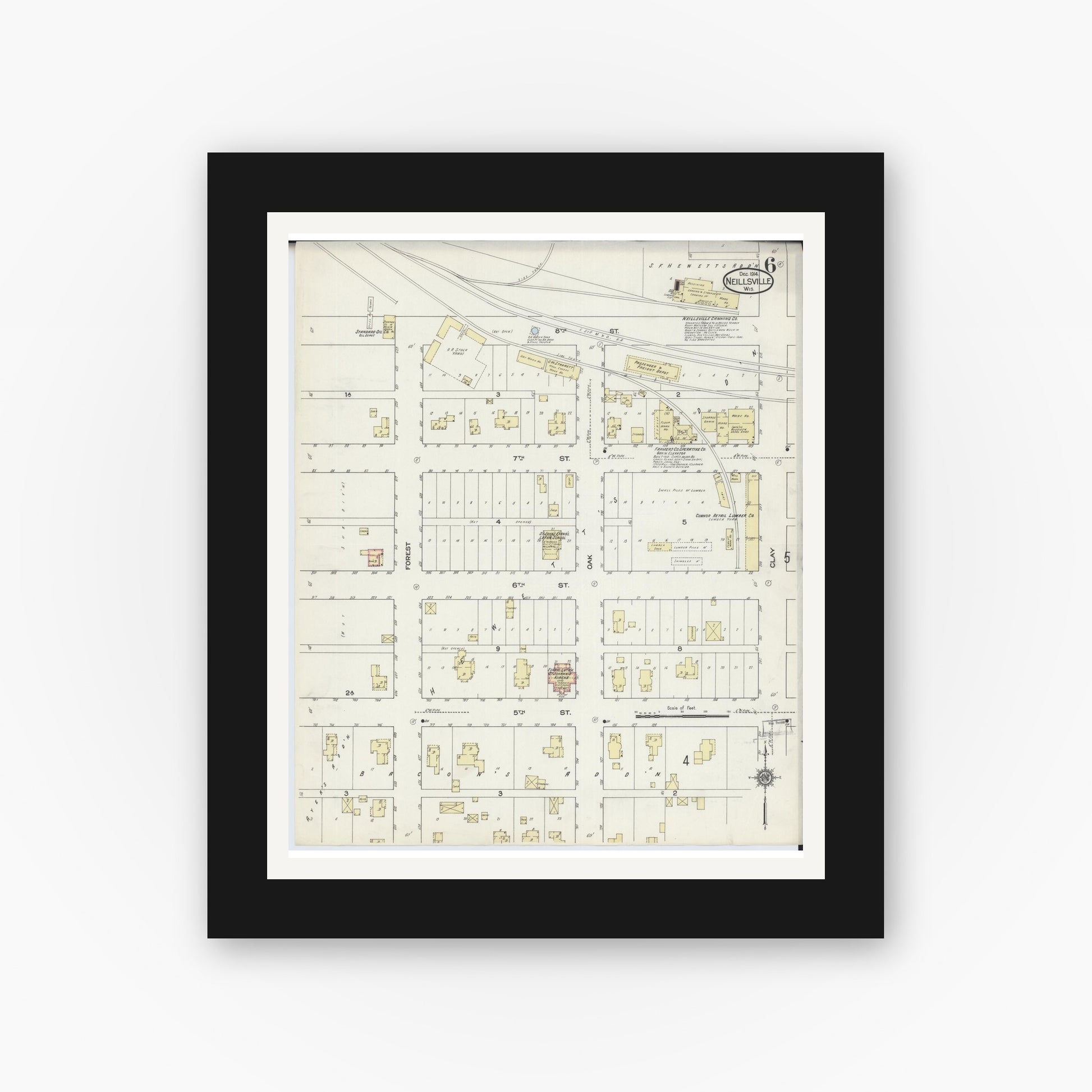 Old map wall art mockup — black gallery frame with white mat — Sanborn Fire Insurance Map from Neillsville, Clark County, Wisconsin (1914), Sheet #0006