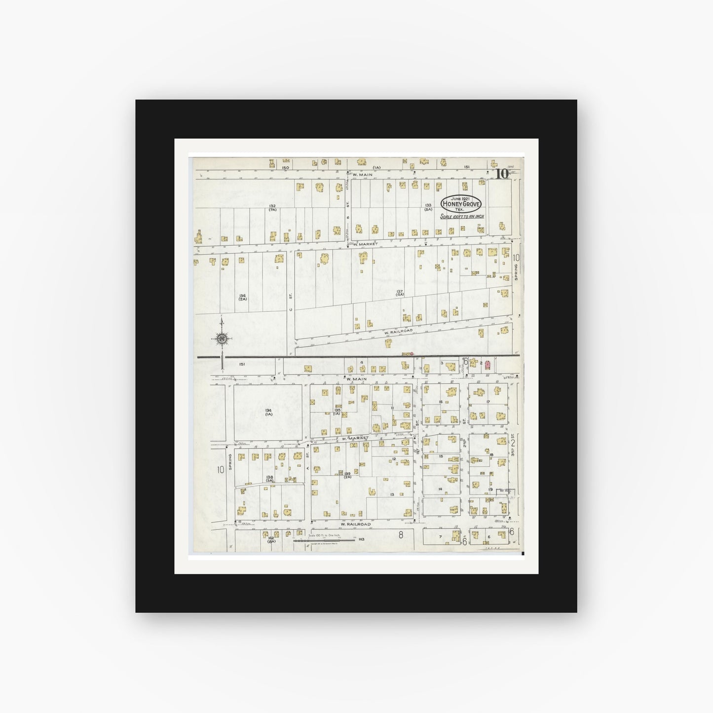 Old map wall art mockup — black gallery frame with white mat — Sanborn Fire Insurance Map from Honey Grove, Fannin County, Texas (1921), Sheet #0010