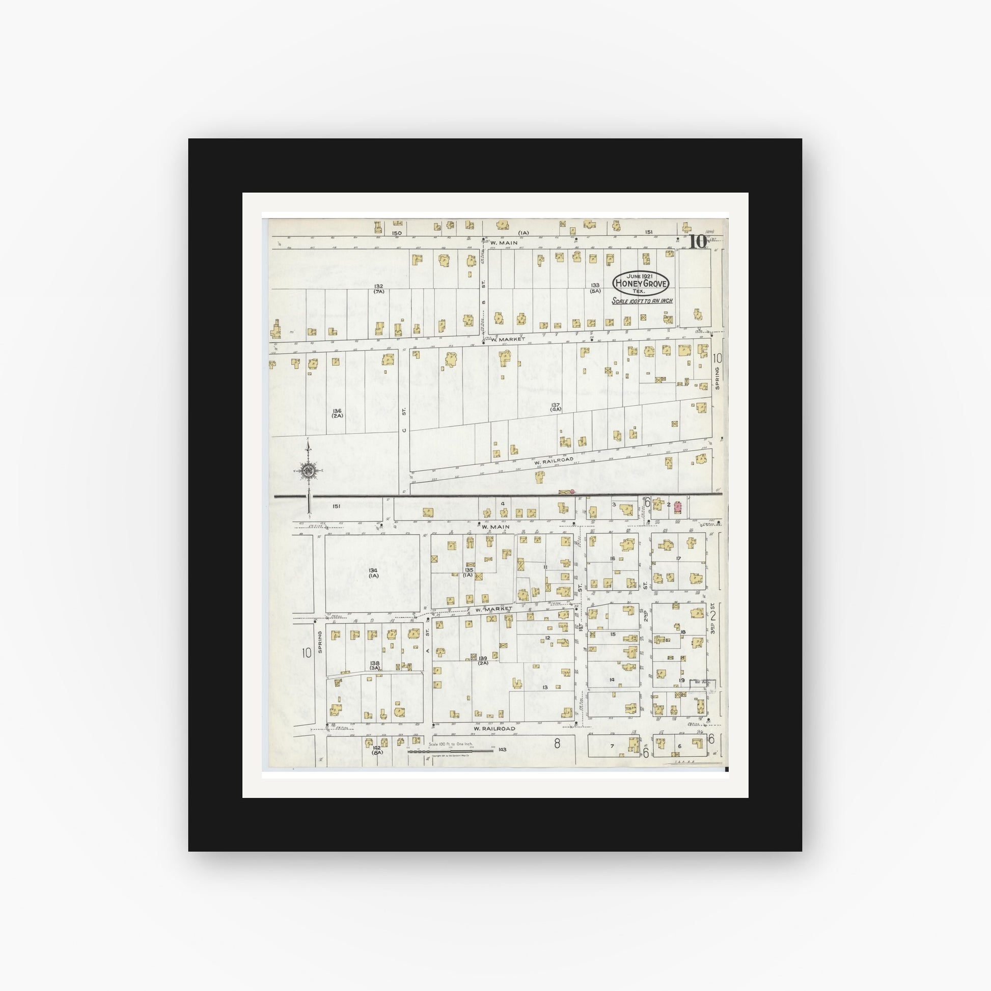 Old map wall art mockup — black gallery frame with white mat — Sanborn Fire Insurance Map from Honey Grove, Fannin County, Texas (1921), Sheet #0010