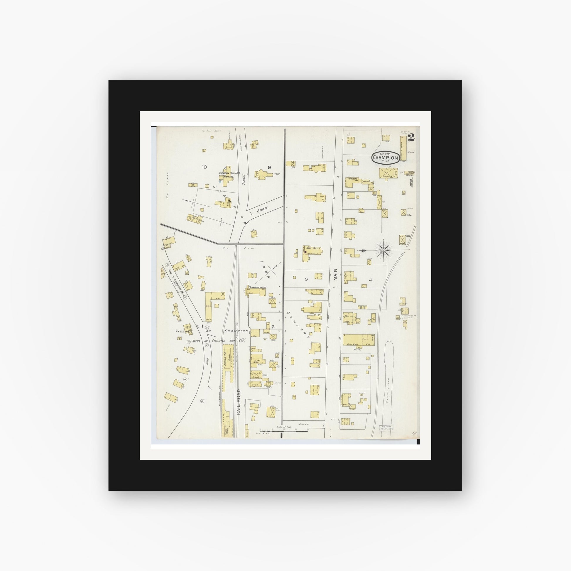 Old map wall art mockup — black gallery frame with white mat — Sanborn Fire Insurance Map from Champion, Marquette County, Michigan (1892), Sheet #0002