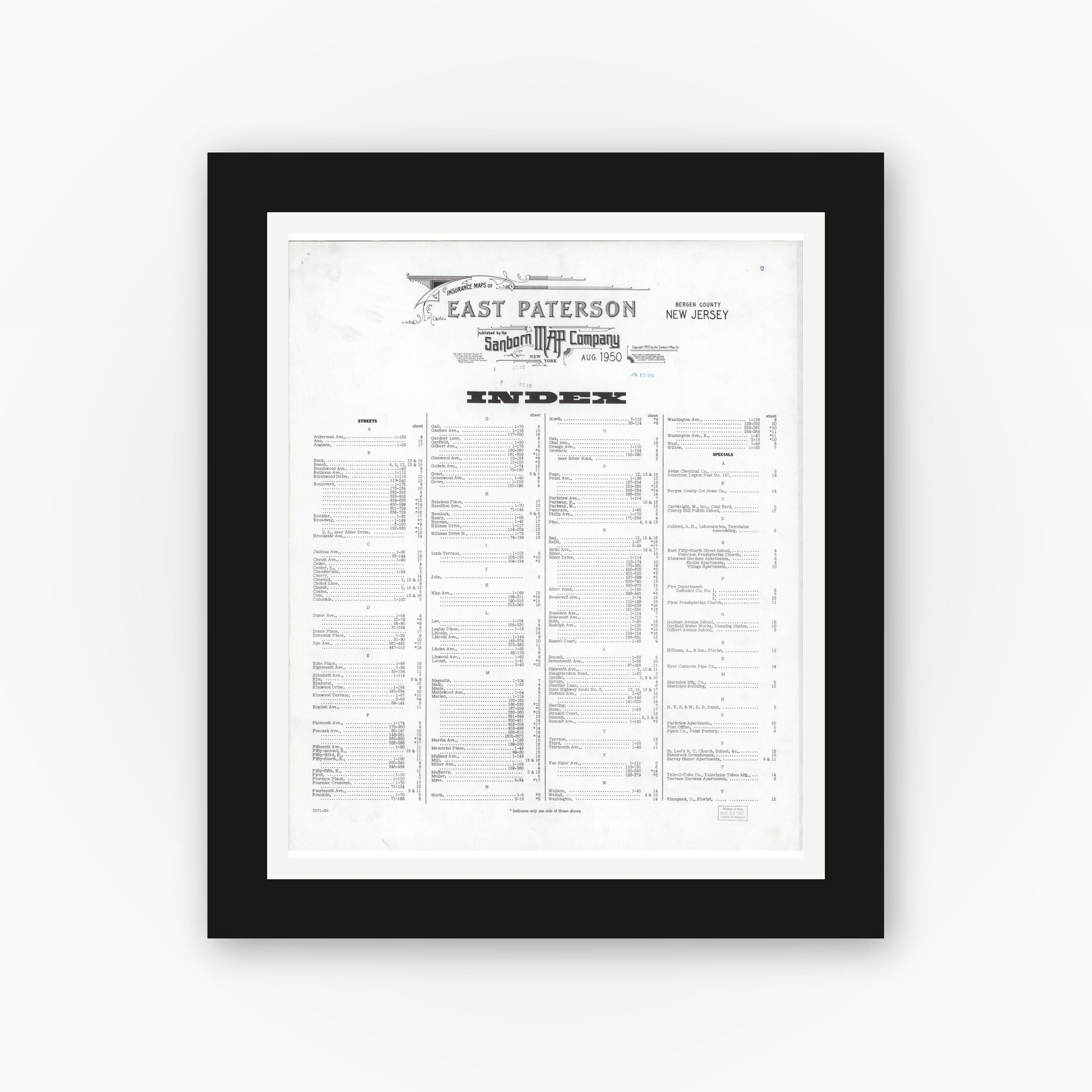 Old map wall art mockup — black gallery frame with white mat — Sanborn Fire Insurance Map from East Paterson, Bergen County, New Jersey (1950), Sheet #0001