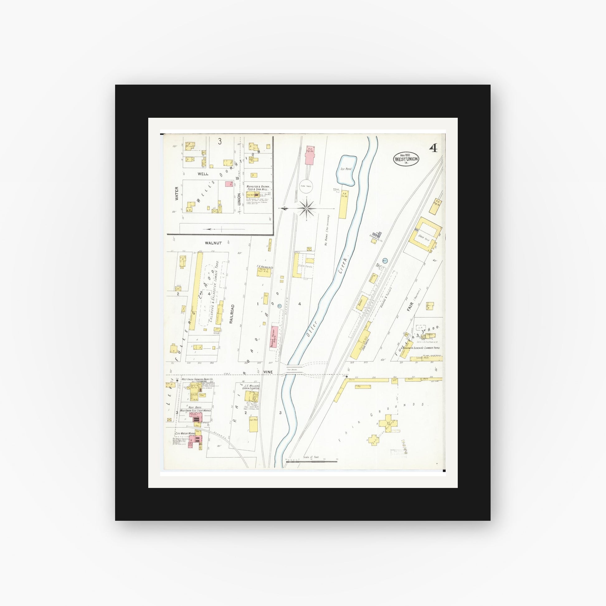Old map wall art mockup — black gallery frame with white mat — Sanborn Fire Insurance Map from West Union, Fayette County, Iowa (1902), Sheet #0004