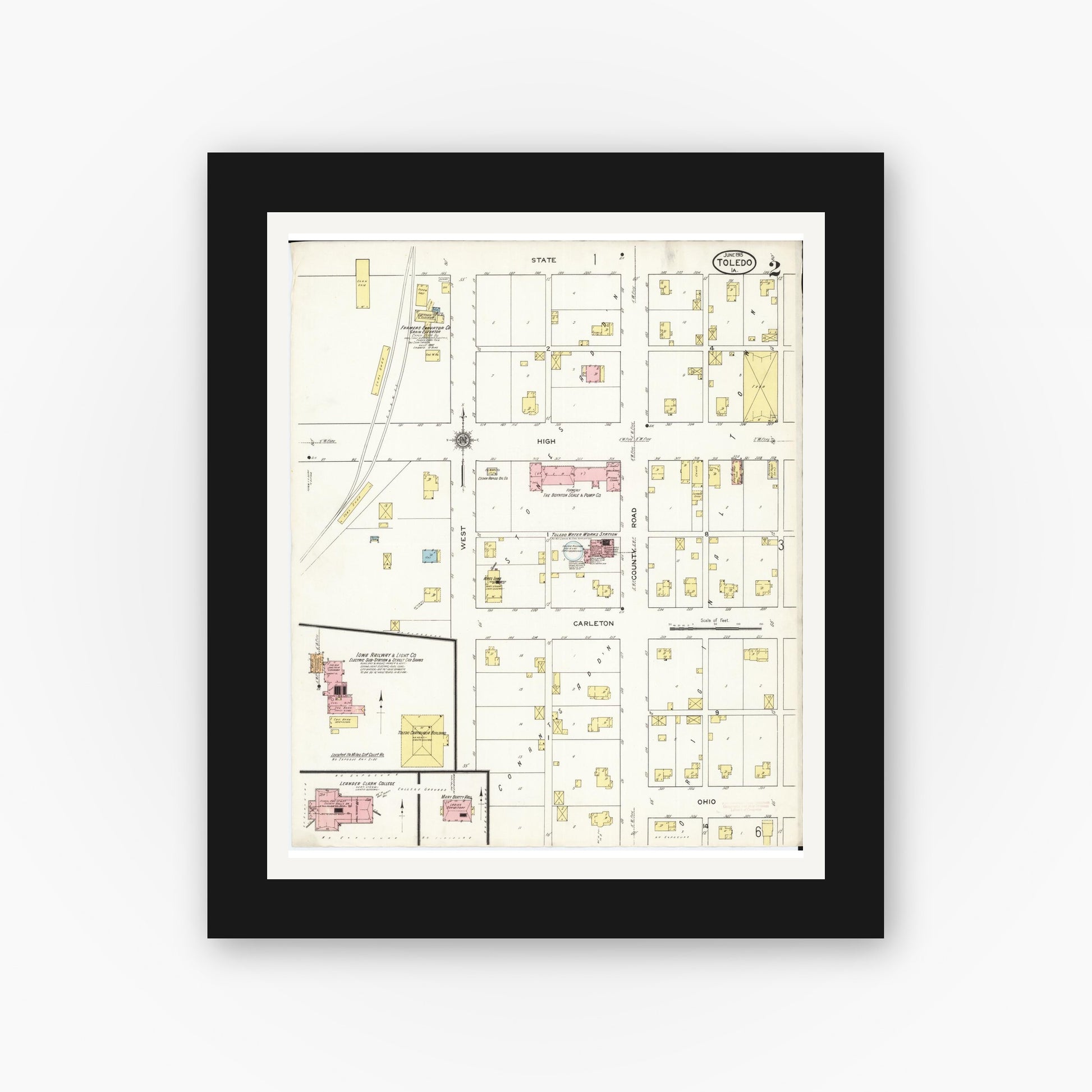 Old map wall art mockup — black gallery frame with white mat — Sanborn Fire Insurance Map from Toledo, Tama County, Iowa (1915), Sheet #0002