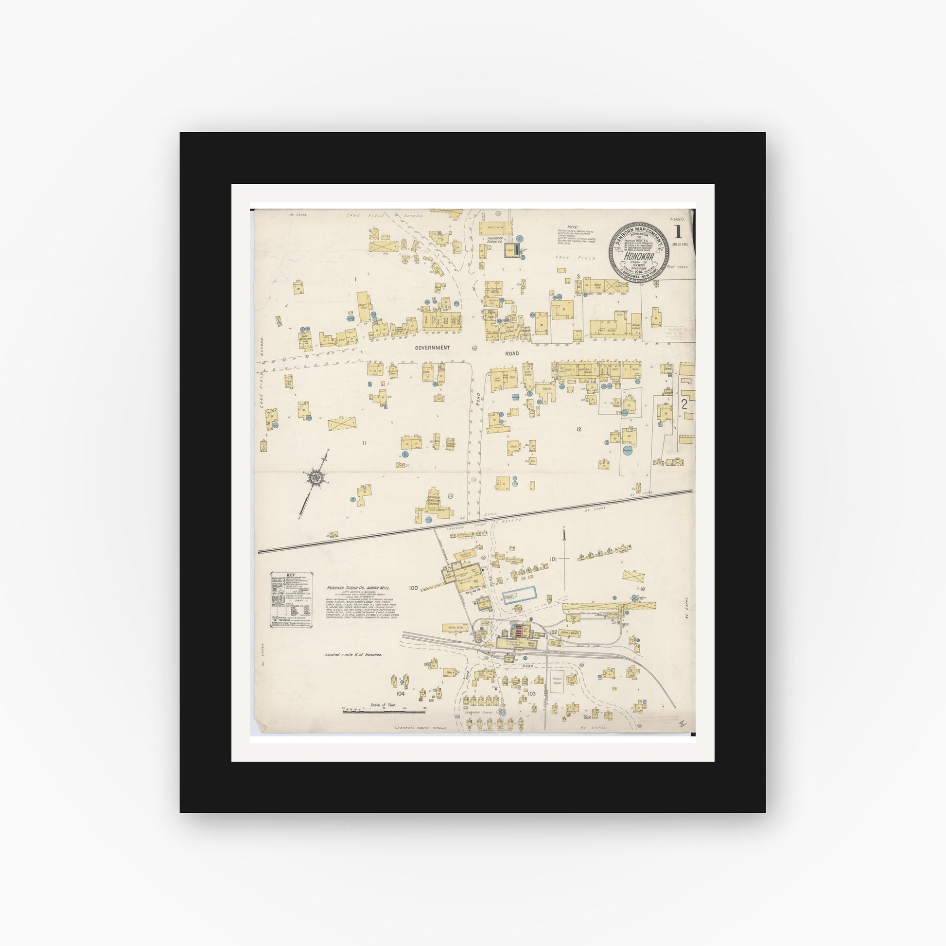 Old map wall art mockup — black gallery frame with white mat — Sanborn Fire Insurance Map from Honokaa, Hawaii County, Hawaii (1914) — Complete Set