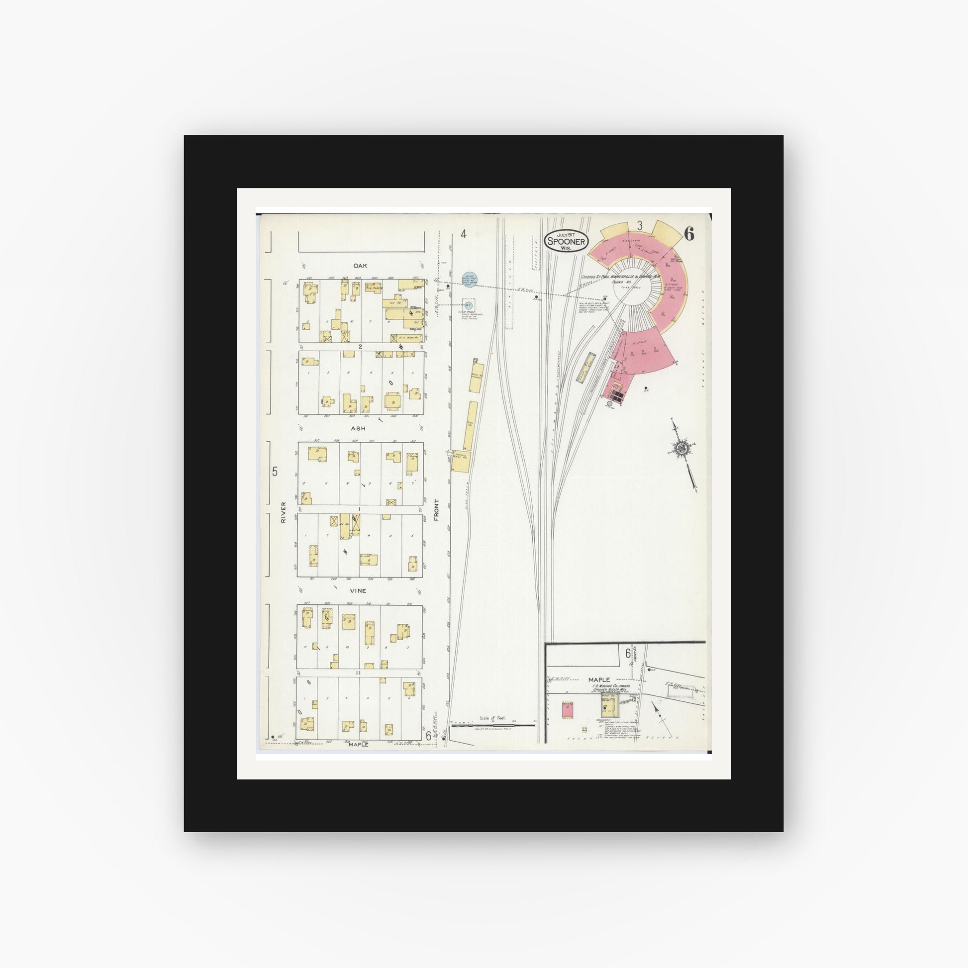 Old map wall art mockup — black gallery frame with white mat — Sanborn Fire Insurance Map from Spooner, Washburn County, Wisconsin (1917), Sheet #0006