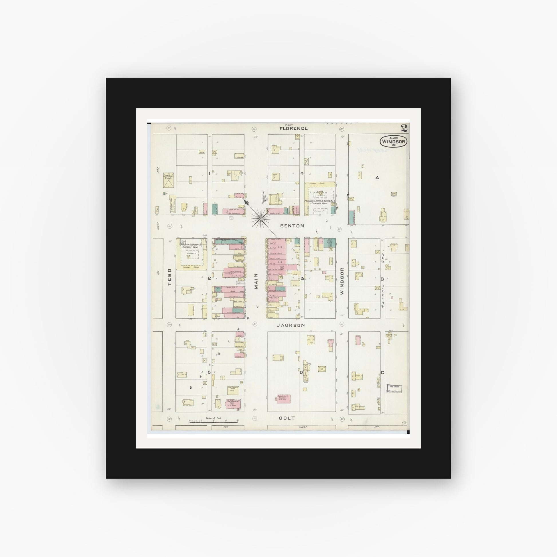 Old map wall art mockup — black gallery frame with white mat — Sanborn Fire Insurance Map from Windsor, Henry County, Missouri (1891), Sheet #0002