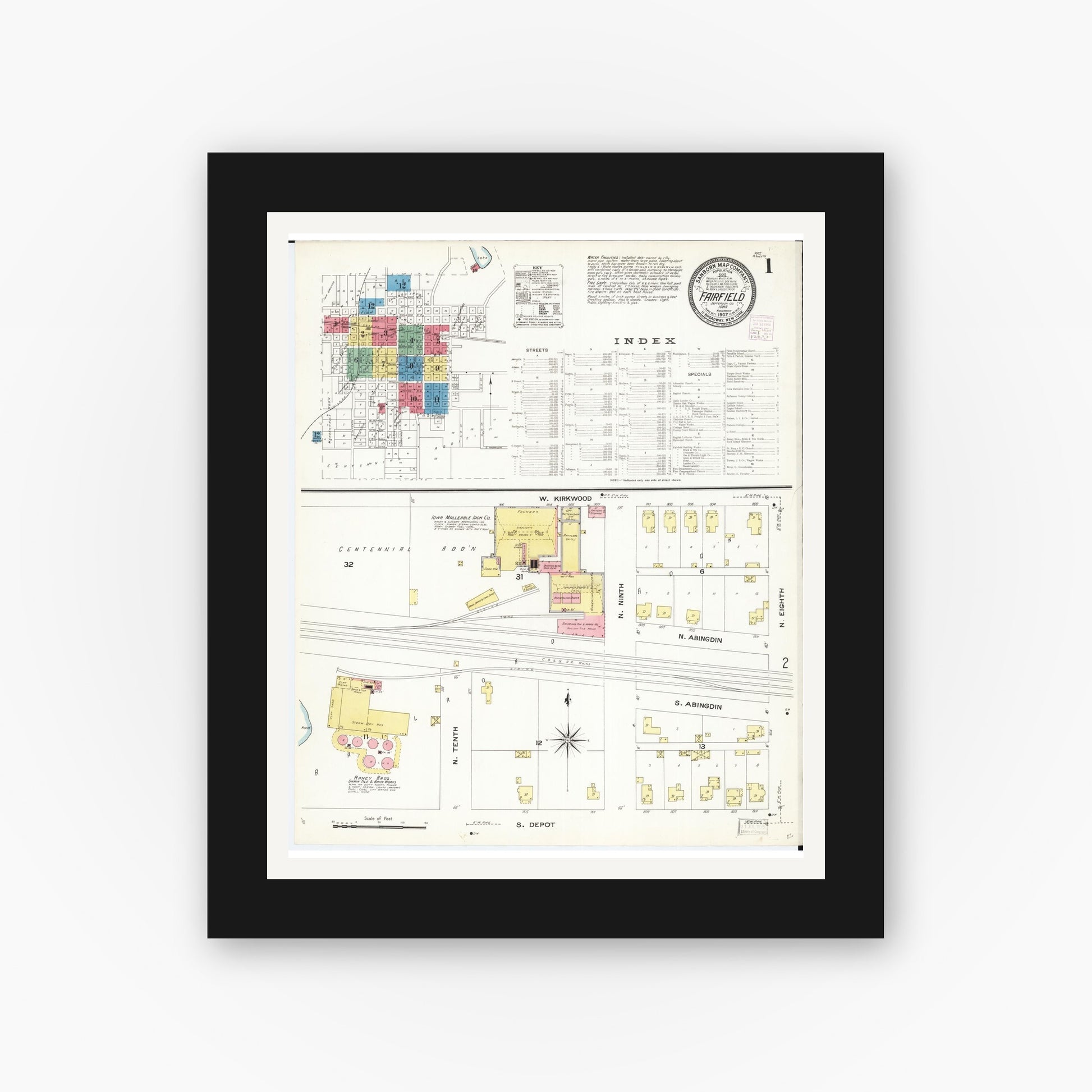 Old map wall art mockup — black gallery frame with white mat — Sanborn Fire Insurance Map from Fairfield, Jefferson County, Iowa (1907) â€” Complete Set