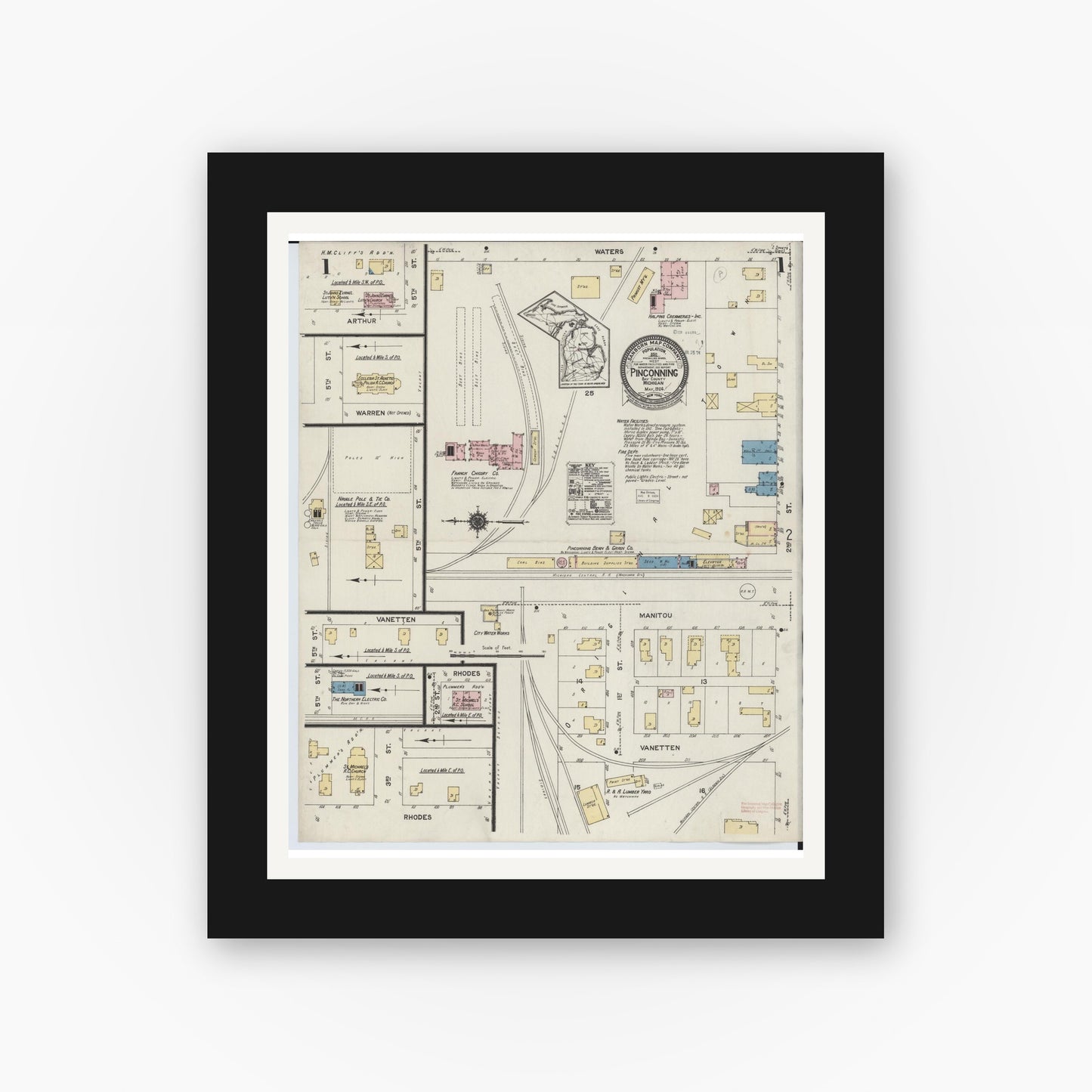 Old map wall art mockup — black gallery frame with white mat — Sanborn Fire Insurance Map from Pinconning, Bay County, Michigan (1924), Sheet #0001