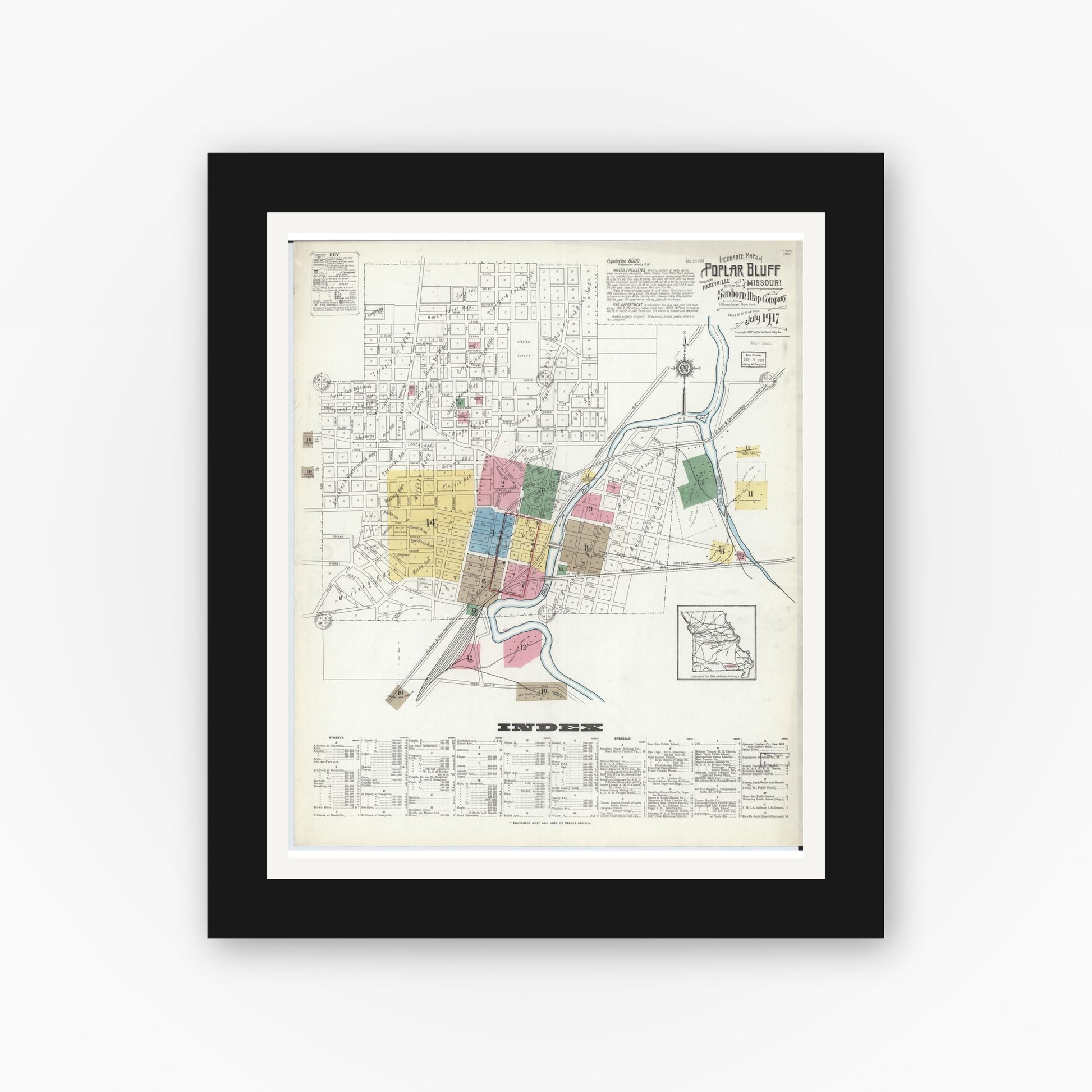 Old map wall art mockup — black gallery frame with white mat — Sanborn Fire Insurance Map from Poplar Bluff, Butler County, Missouri (1917) - Complete Map Set