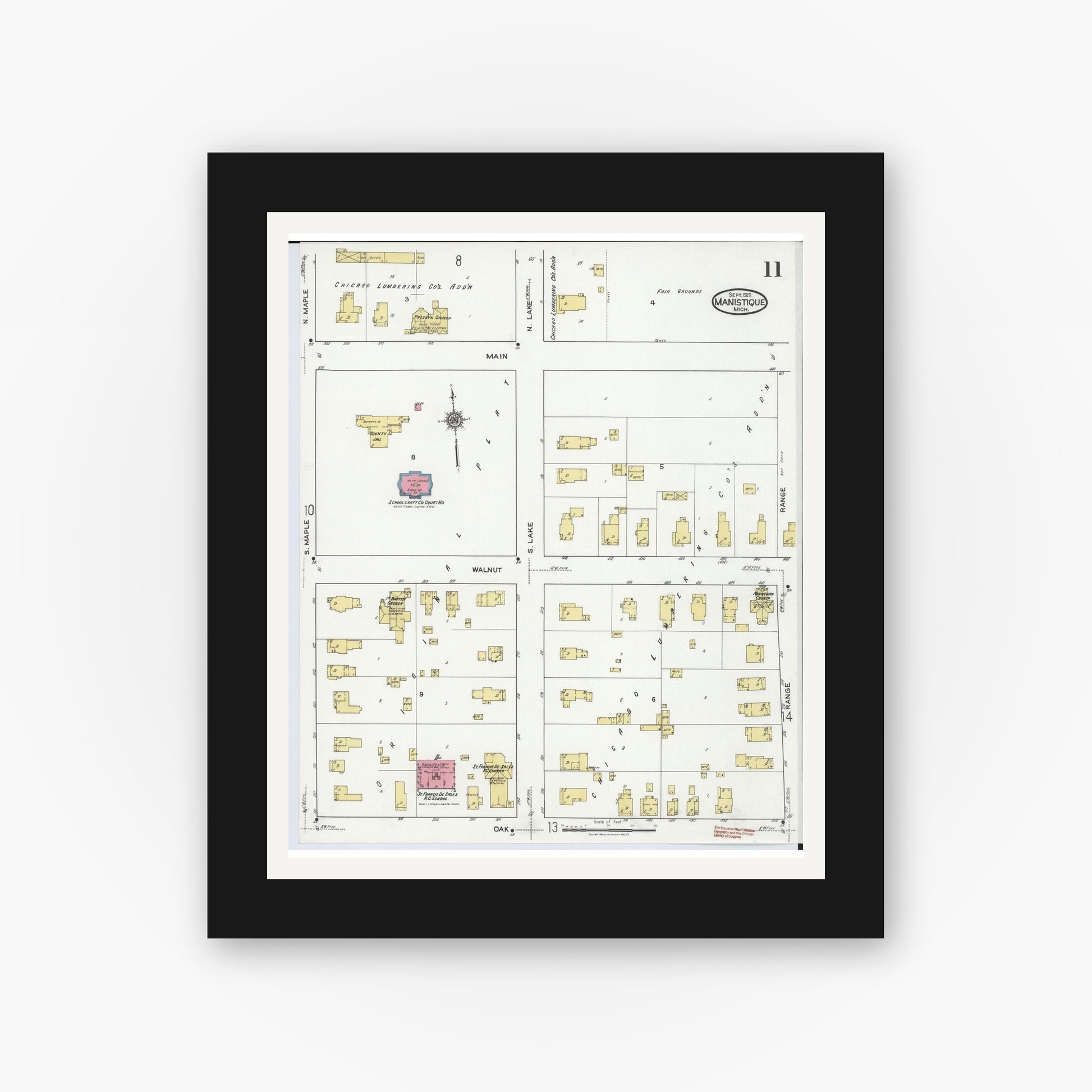 Old map wall art mockup — black gallery frame with white mat — Sanborn Fire Insurance Map from Manistique, Schoolcraft County, Michigan (1920), Sheet #0011