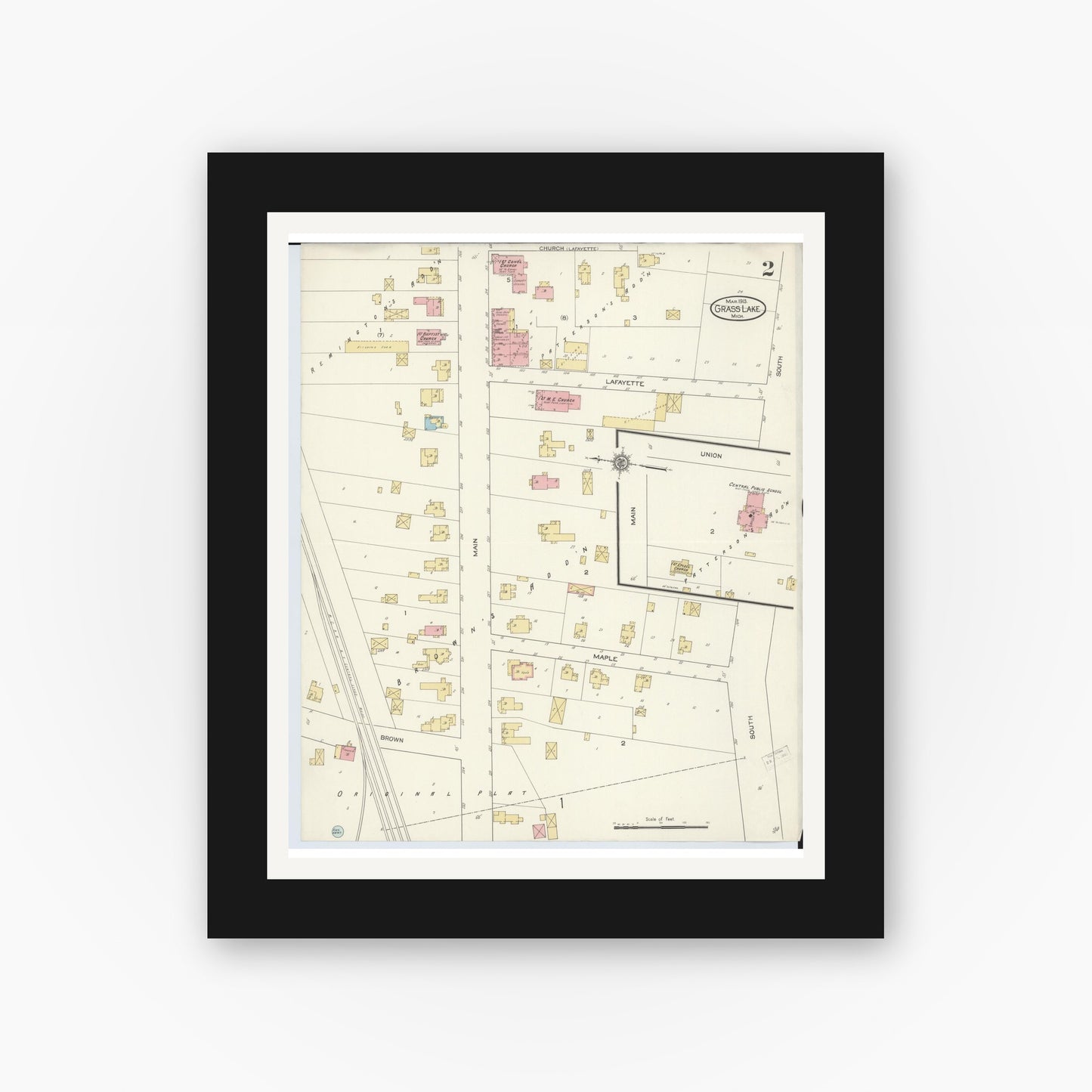 Old map wall art mockup — black gallery frame with white mat — Sanborn Fire Insurance Map from Grass Lake, Jackson County, Michigan (1913), Sheet #0002