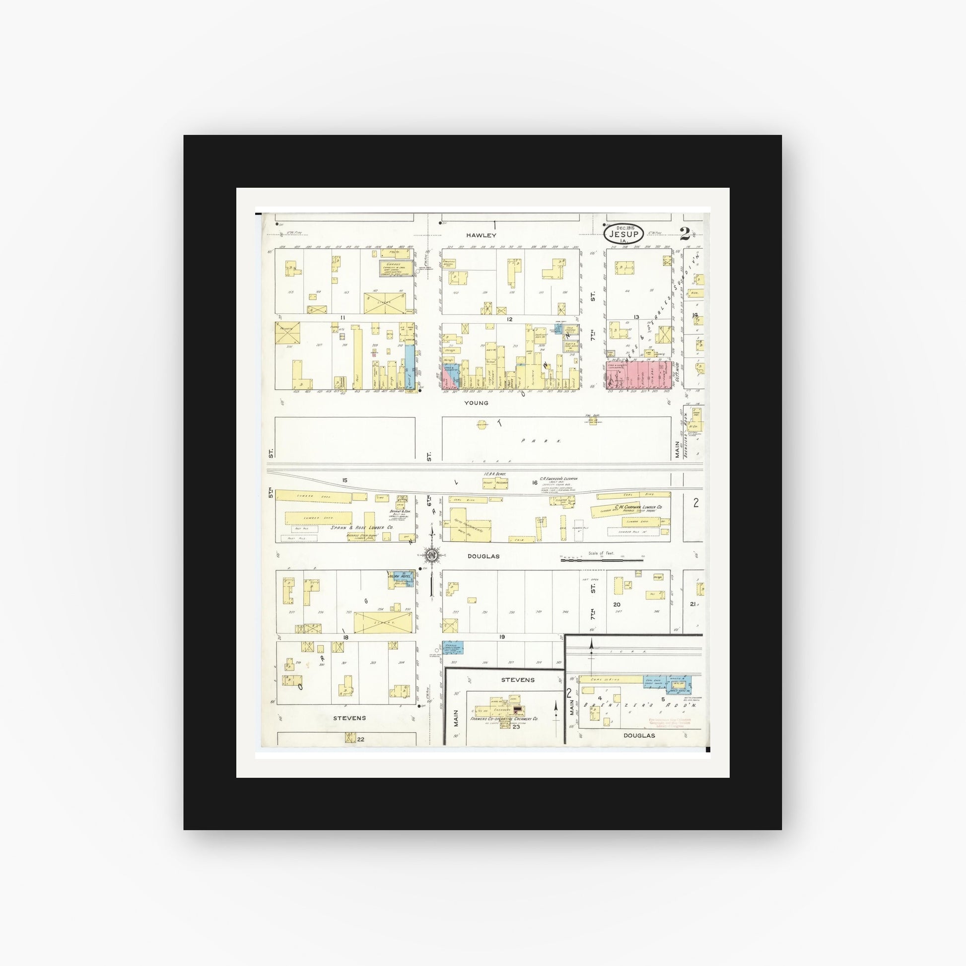 Old map wall art mockup — black gallery frame with white mat — Sanborn Fire Insurance Map from Jesup, Buchanan County, Iowa (1915), Sheet #0002