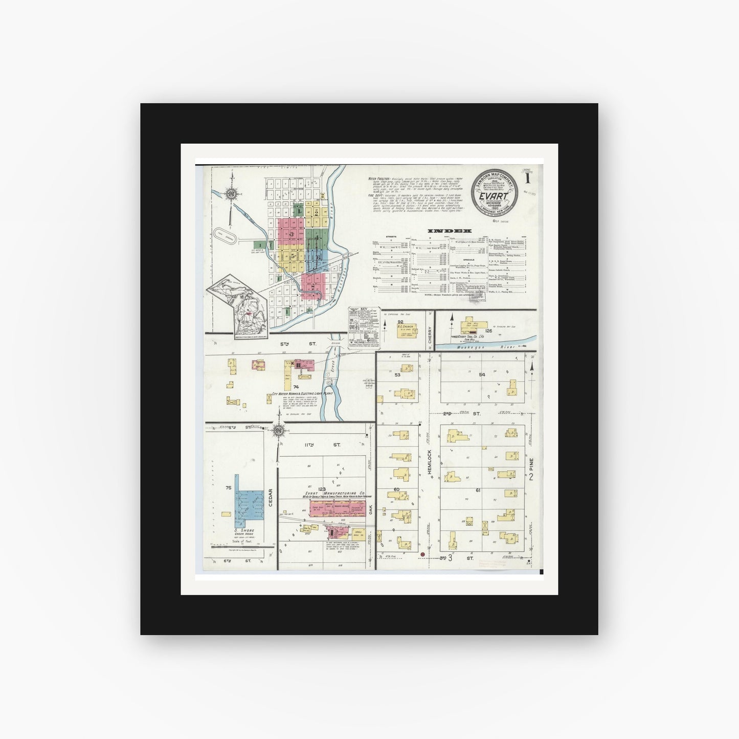 Old map wall art mockup — black gallery frame with white mat — Sanborn Fire Insurance Map from Evart, Osceola County, Michigan (1920), Sheet #0001