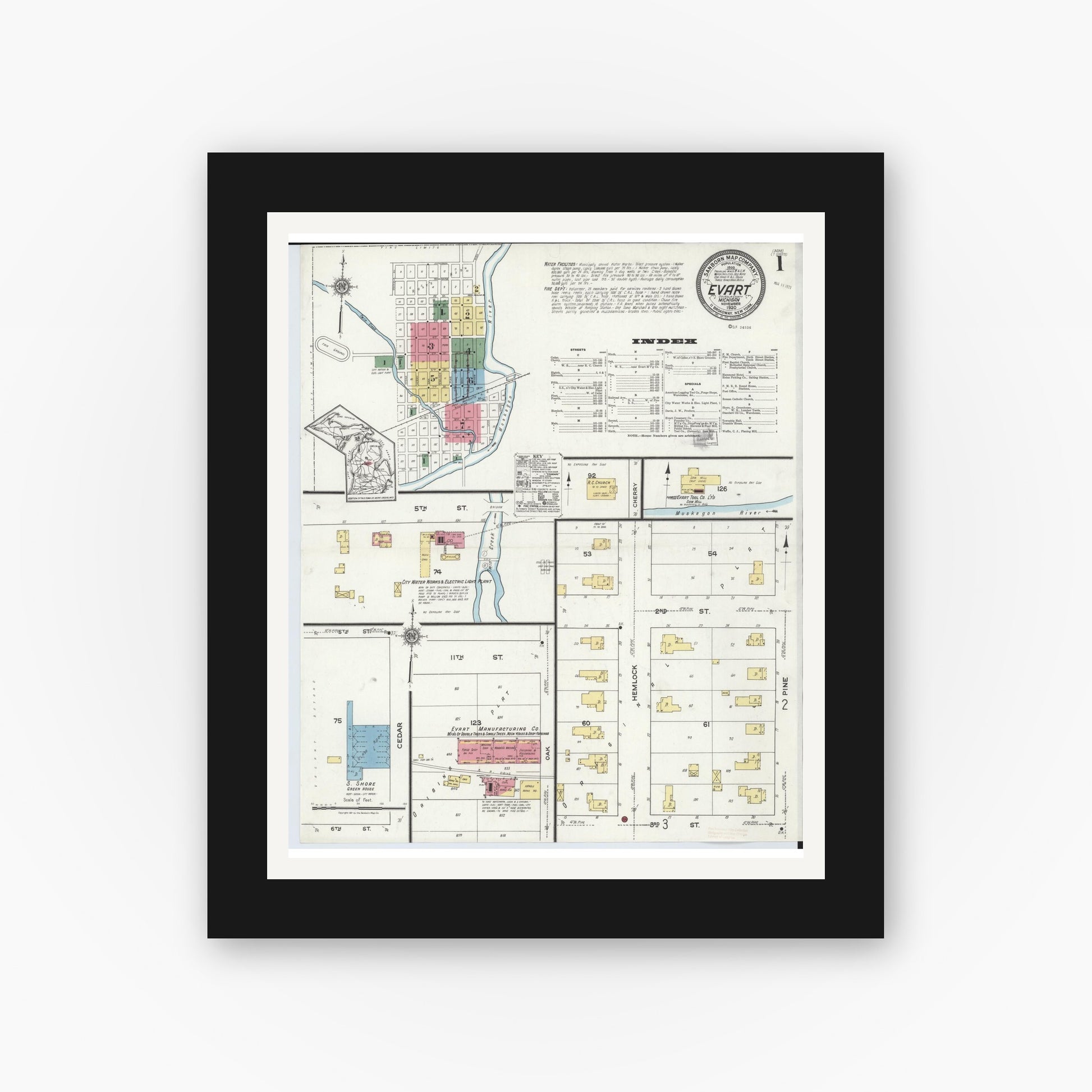 Old map wall art mockup — black gallery frame with white mat — Sanborn Fire Insurance Map from Evart, Osceola County, Michigan (1920), Sheet #0001