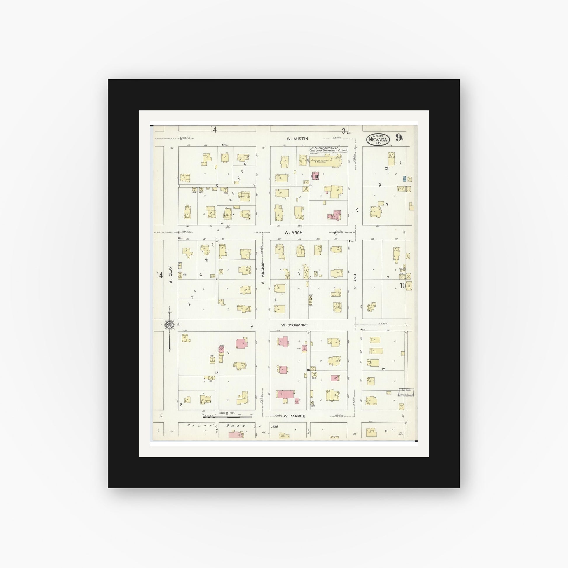 Old map wall art mockup — black gallery frame with white mat — Sanborn Fire Insurance Map from Nevada, Vernon County, Missouri (1914), Sheet #0009