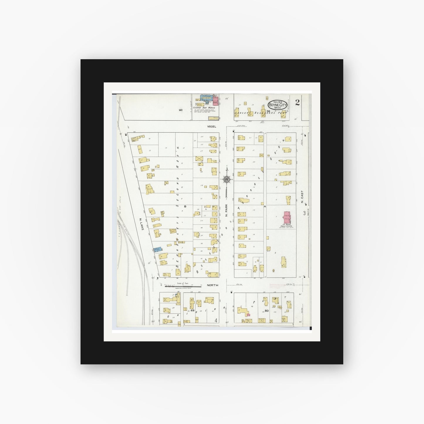 Old map wall art mockup — black gallery frame with white mat — Sanborn Fire Insurance Map from Boyne City, Charlevoix County, Michigan (1919), Sheet #0002