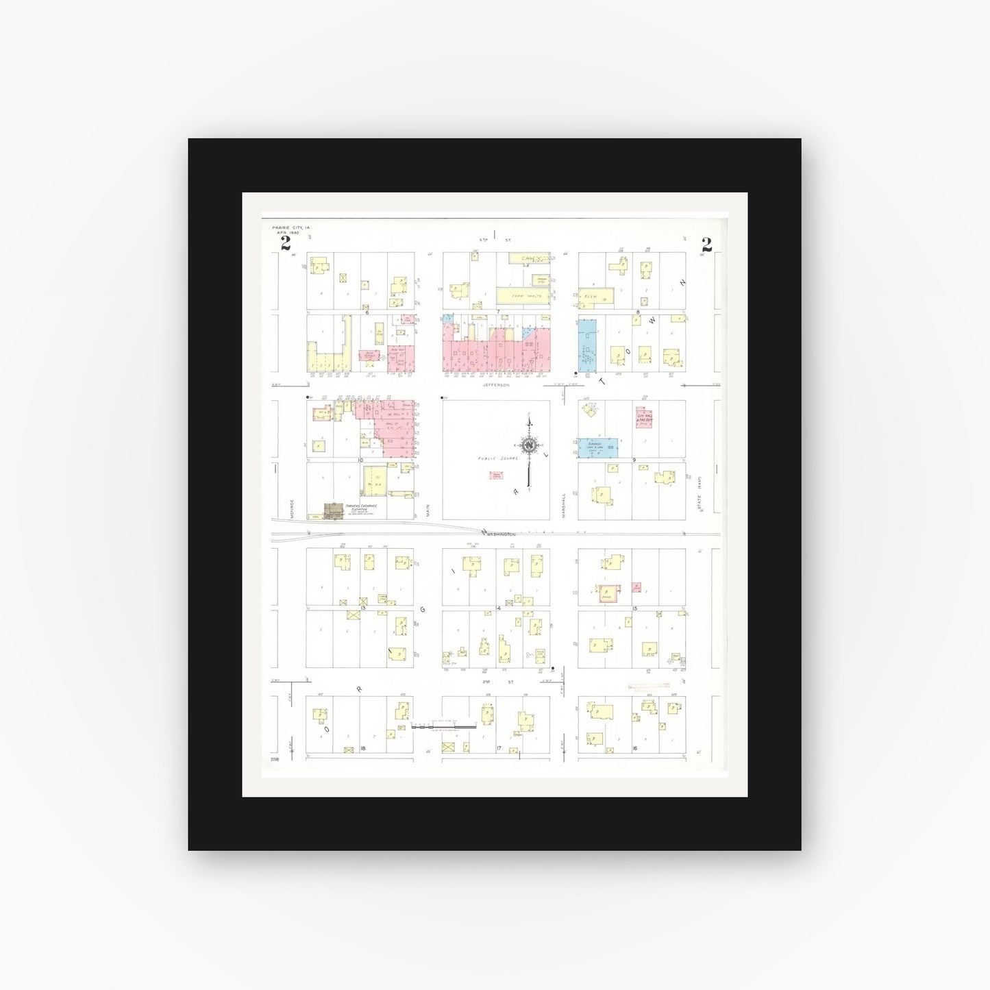 Old map wall art mockup — black gallery frame with white mat — Sanborn Fire Insurance Map from Prairie City, Jasper County, Iowa (1940), Sheet #0002