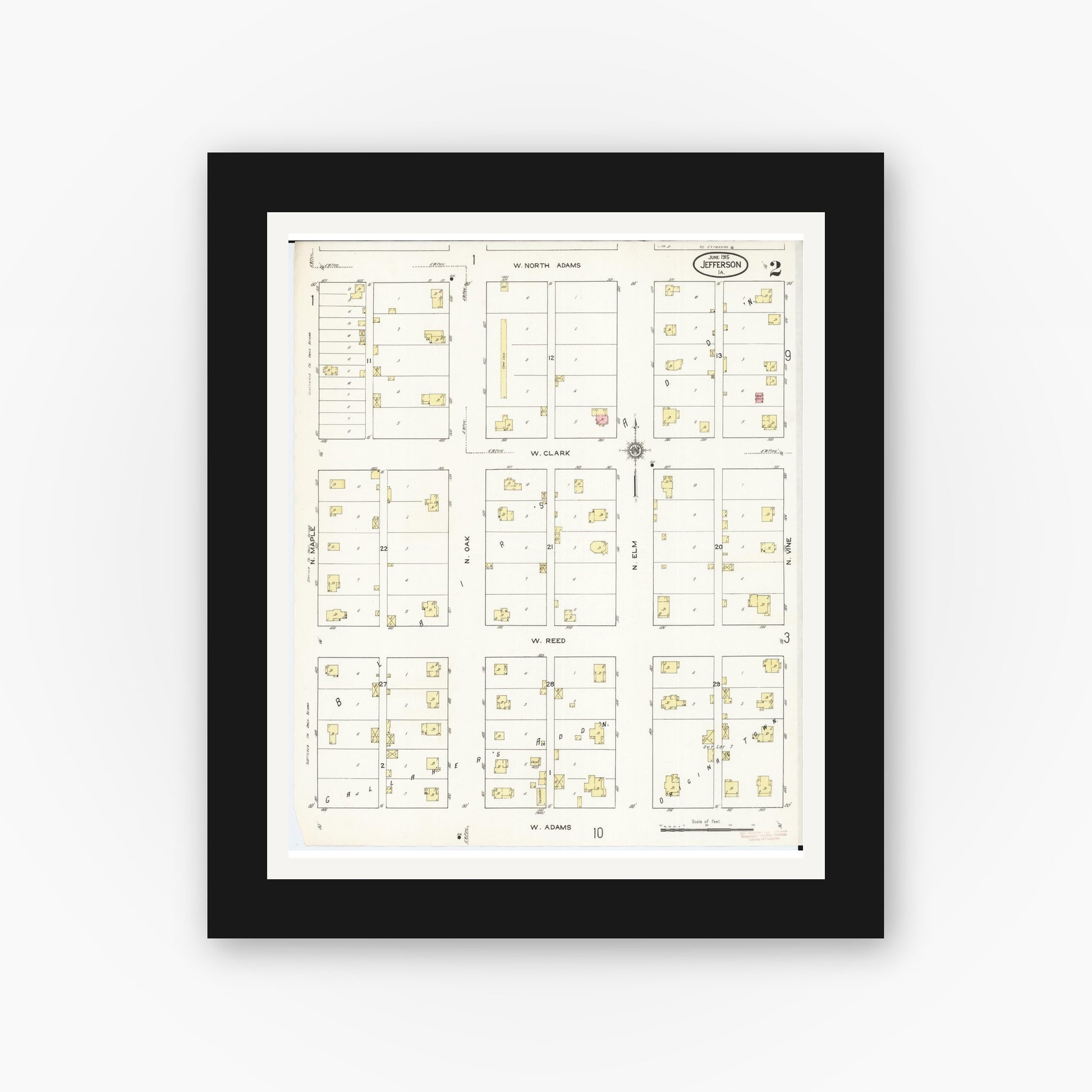 Old map wall art mockup — black gallery frame with white mat — Sanborn Fire Insurance Map from Jefferson, Greene County, Iowa (1915), Sheet #0002