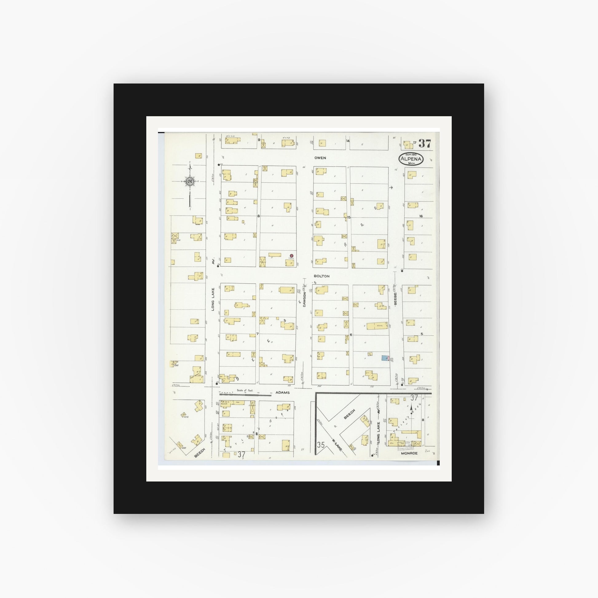 Old map wall art mockup — black gallery frame with white mat — Sanborn Fire Insurance Map from Alpena, Alpena County, Michigan (1910), Sheet #0037