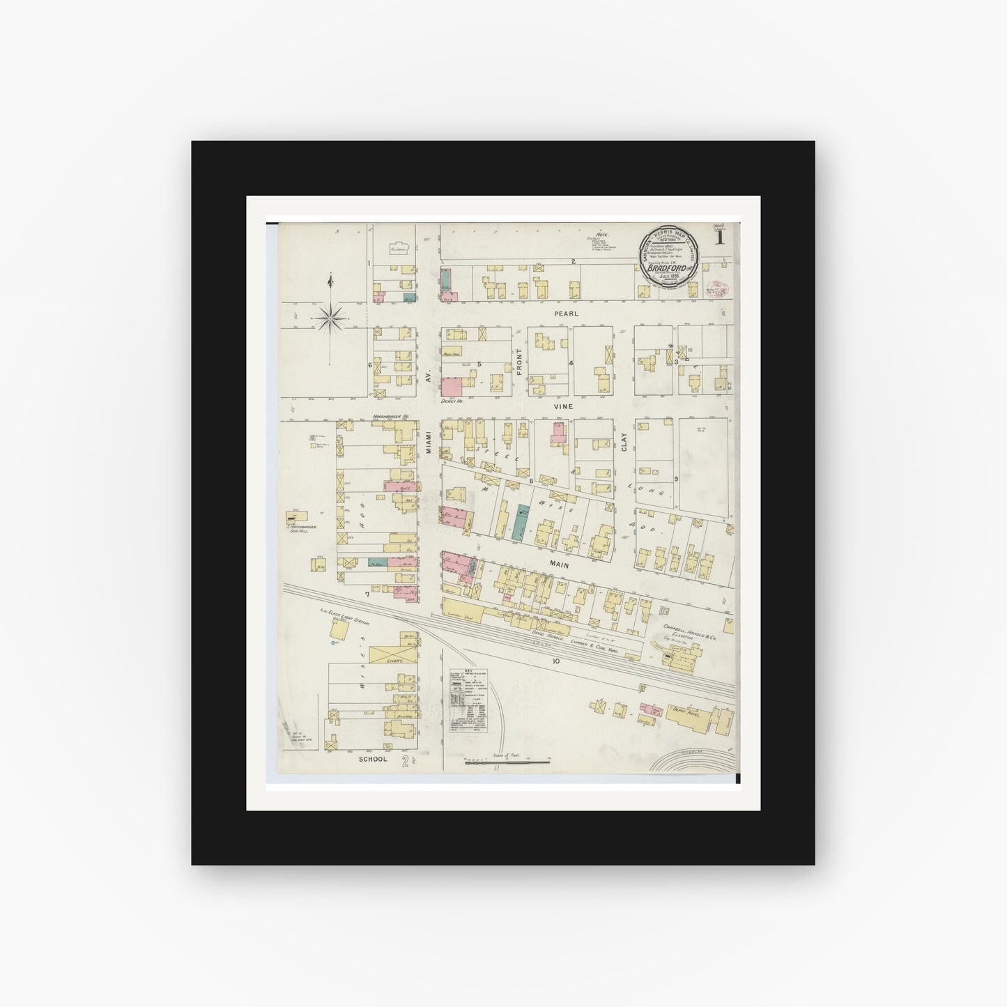 Old map wall art mockup — black gallery frame with white mat — Sanborn Fire Insurance Map from Bradford, Darke and Miami Counties, Ohio (1895), Sheet #0001