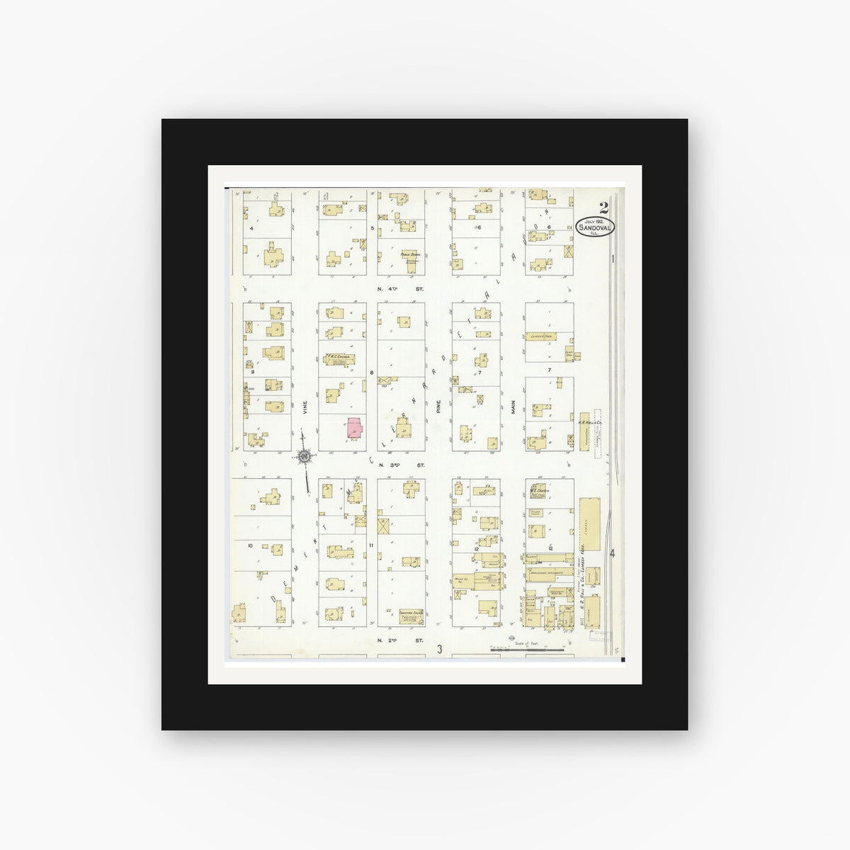Old map wall art mockup — black gallery frame with white mat — Sanborn Fire Insurance Map from Sandoval, Marion County, Illinois (1912), Sheet #0002
