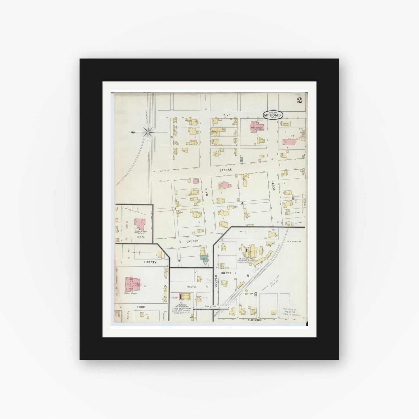 Old map wall art mockup — black gallery frame with white mat — Sanborn Fire Insurance Map from McComb, Hancock County, Ohio (1885), Sheet #0002