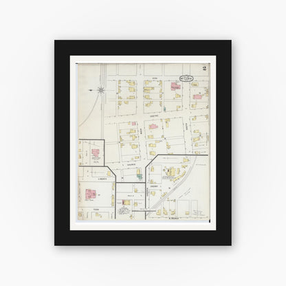 Old map wall art mockup — black gallery frame with white mat — Sanborn Fire Insurance Map from McComb, Hancock County, Ohio (1885), Sheet #0002