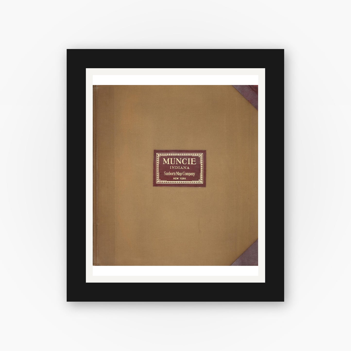 Old map wall art mockup — black gallery frame with white mat — Sanborn Fire Insurance Map from Muncie, Delaware County, Indiana (1950), Sheet #0001