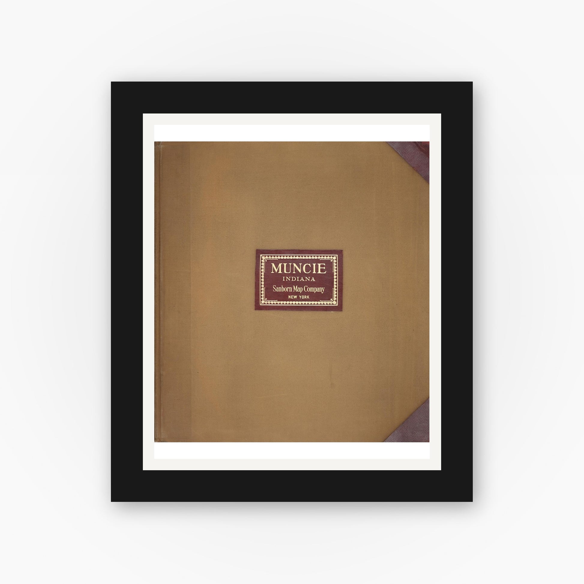 Old map wall art mockup — black gallery frame with white mat — Sanborn Fire Insurance Map from Muncie, Delaware County, Indiana (1950), Sheet #0001