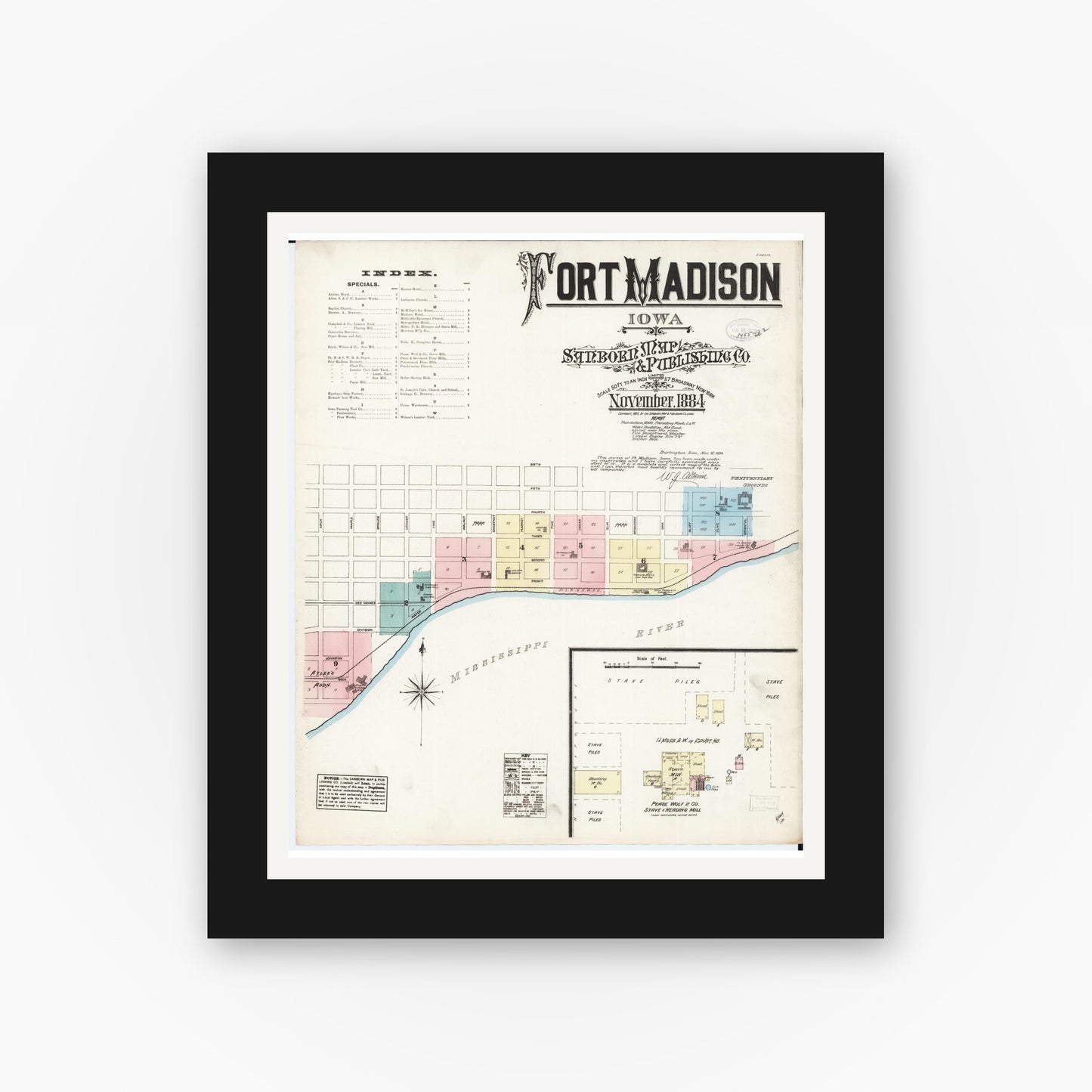 Old map wall art mockup — black gallery frame with white mat — Sanborn Fire Insurance Map from Fort Madison, Lee County, Iowa (1884) â€” Complete Set