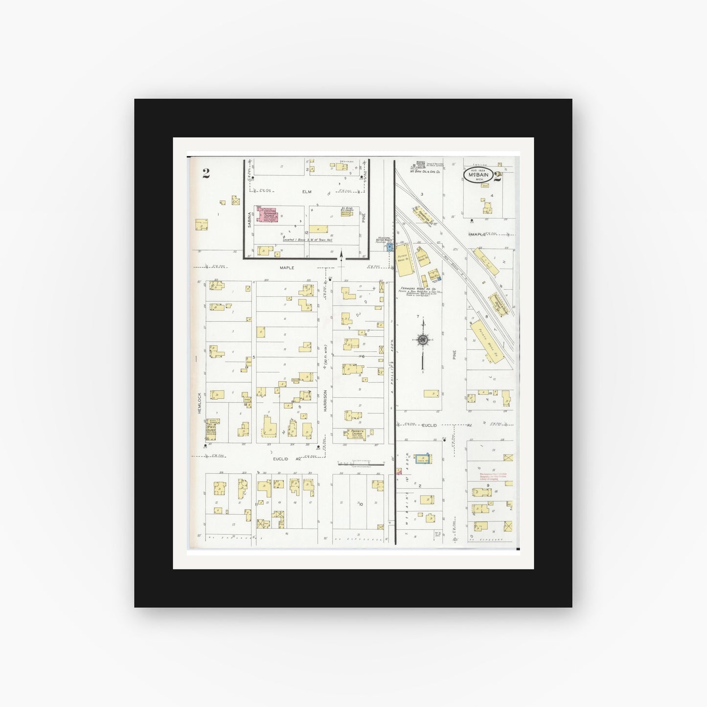 Old map wall art mockup — black gallery frame with white mat — Sanborn Fire Insurance Map from Mcbain, Missaukee County, Michigan (1929), Sheet #0002