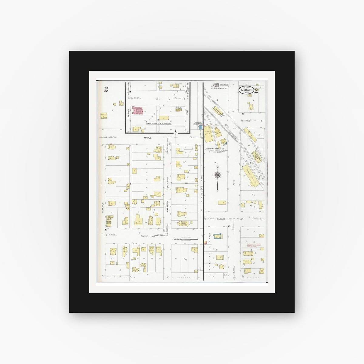 Old map wall art mockup — black gallery frame with white mat — Sanborn Fire Insurance Map from Mcbain, Missaukee County, Michigan (1929), Sheet #0002