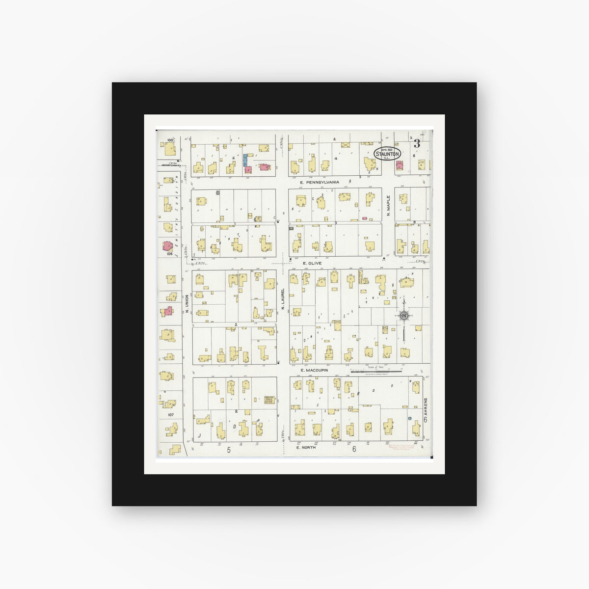 Old map wall art mockup — black gallery frame with white mat — Sanborn Fire Insurance Map from Staunton, Macoupin County, Illinois (1921), Sheet #0003
