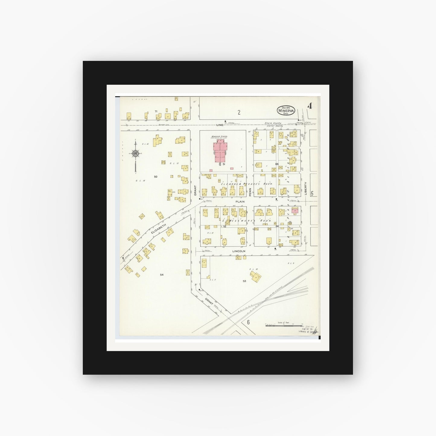 Old map wall art mockup — black gallery frame with white mat — Sanborn Fire Insurance Map from Minerva, Stark And Carroll Counties, Ohio (1915), Sheet #0004