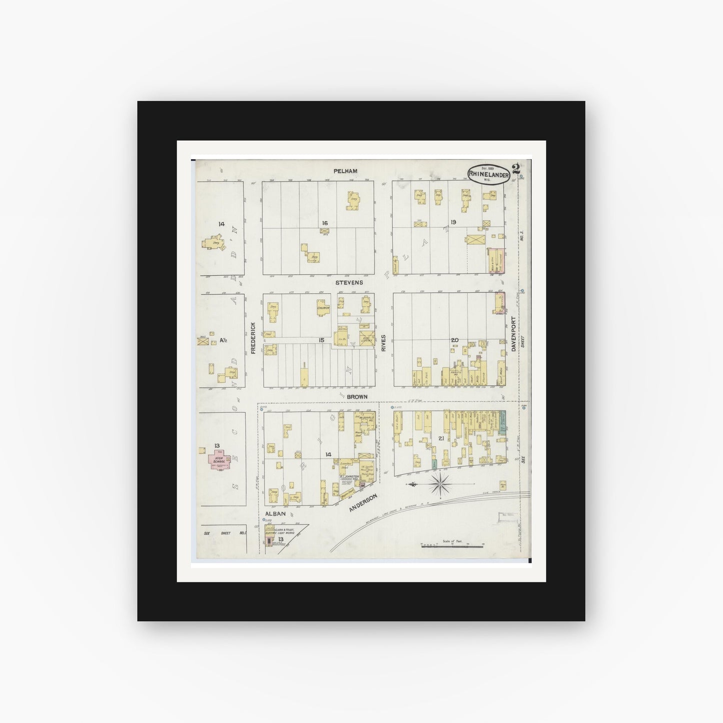 Old map wall art mockup — black gallery frame with white mat — Sanborn Fire Insurance Map from Rhinelander, Oneida County, Wisconsin (1889), Sheet #0002