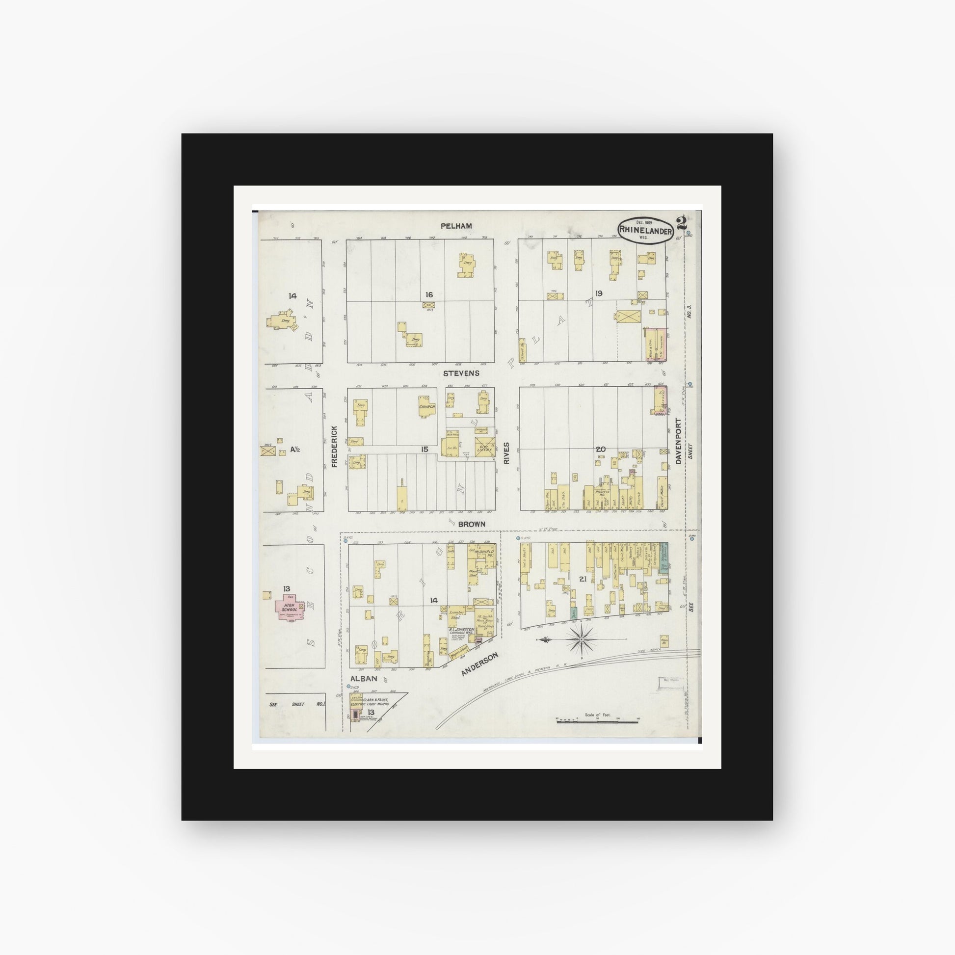 Old map wall art mockup — black gallery frame with white mat — Sanborn Fire Insurance Map from Rhinelander, Oneida County, Wisconsin (1889), Sheet #0002