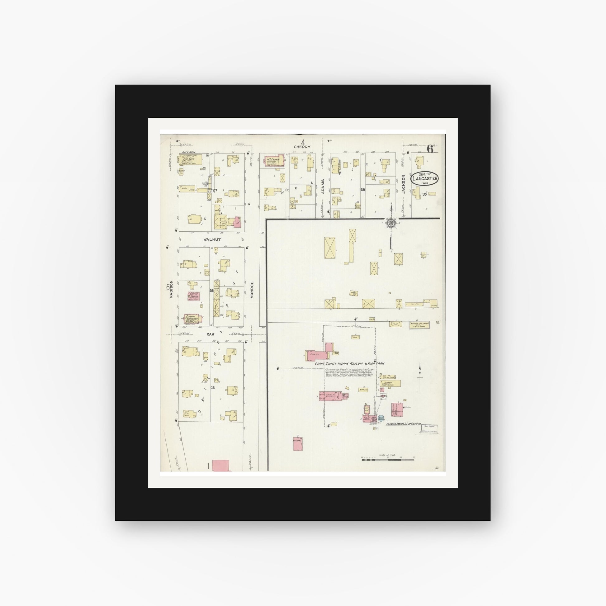 Old map wall art mockup — black gallery frame with white mat — Sanborn Fire Insurance Map from Lancaster, Grant County, Wisconsin (1912), Sheet #0006