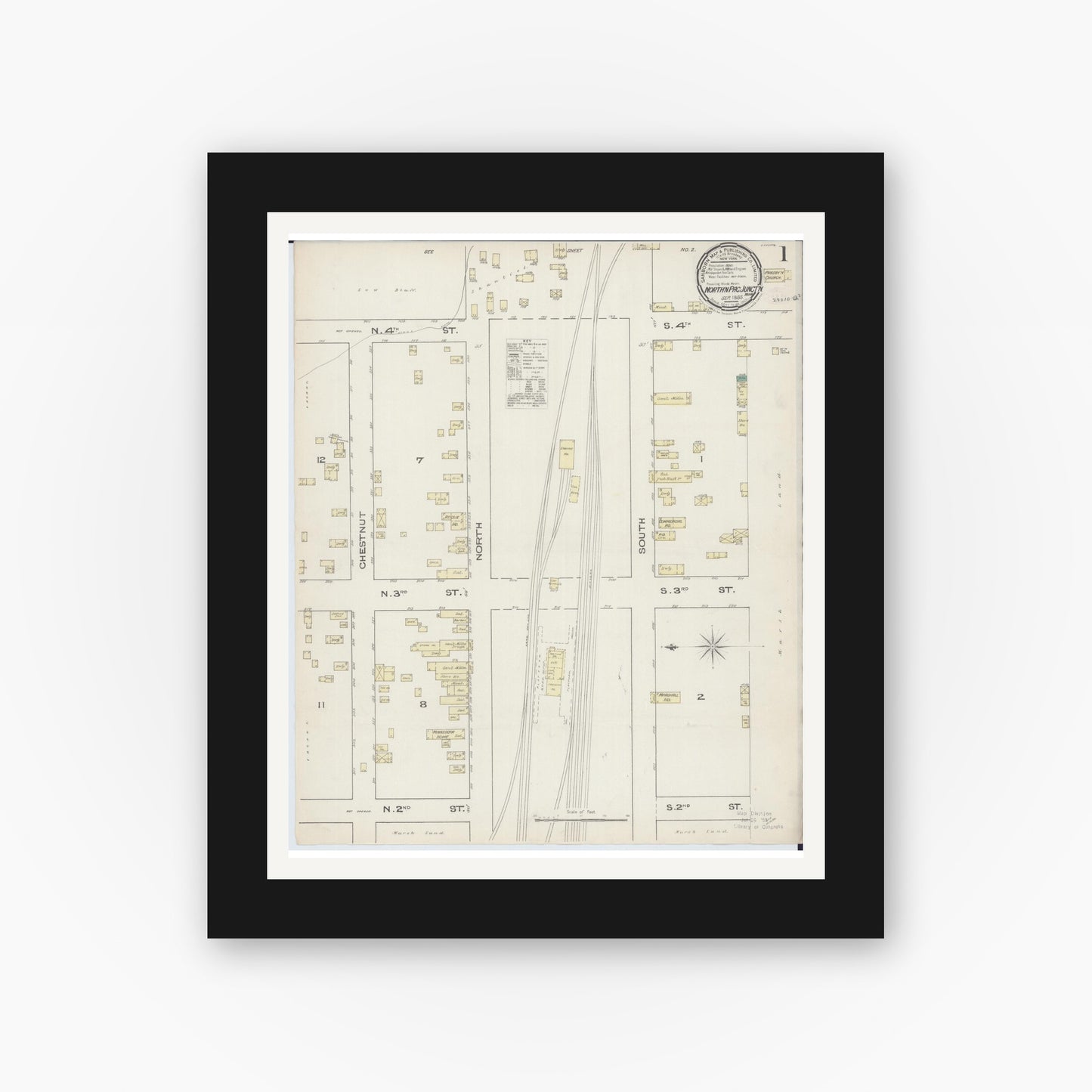 Old map wall art mockup — black gallery frame with white mat — Sanborn Fire Insurance Map from Northern Pacific Junction, Carlton County, Minnesota (1885), Sheet #0001