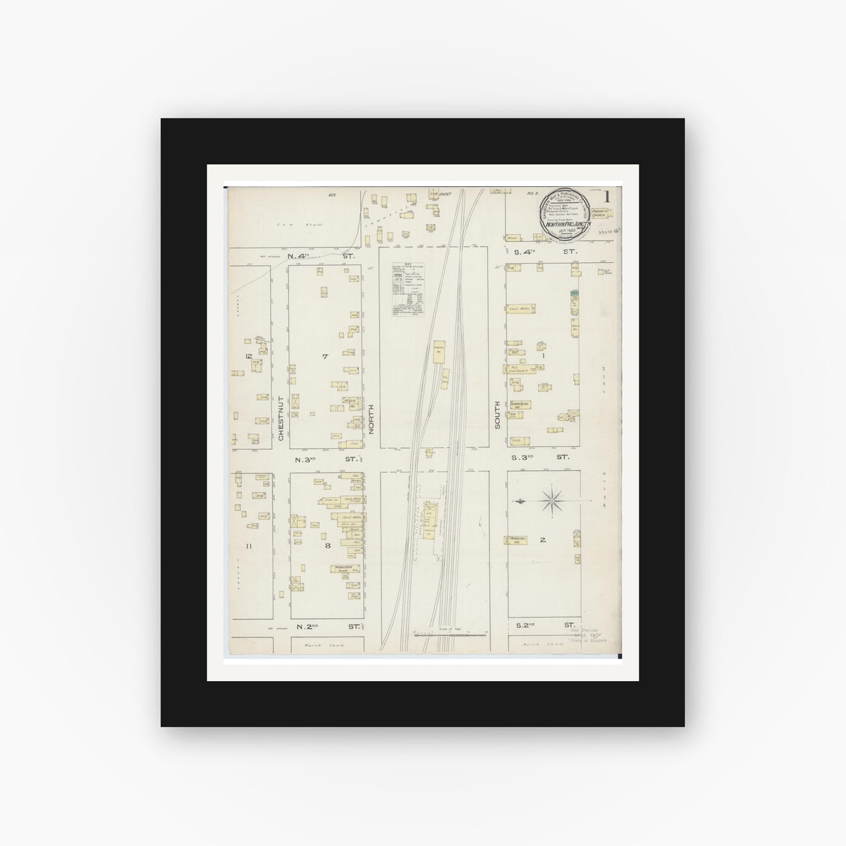 Old map wall art mockup — black gallery frame with white mat — Sanborn Fire Insurance Map from Northern Pacific Junction, Carlton County, Minnesota (1885), Sheet #0001