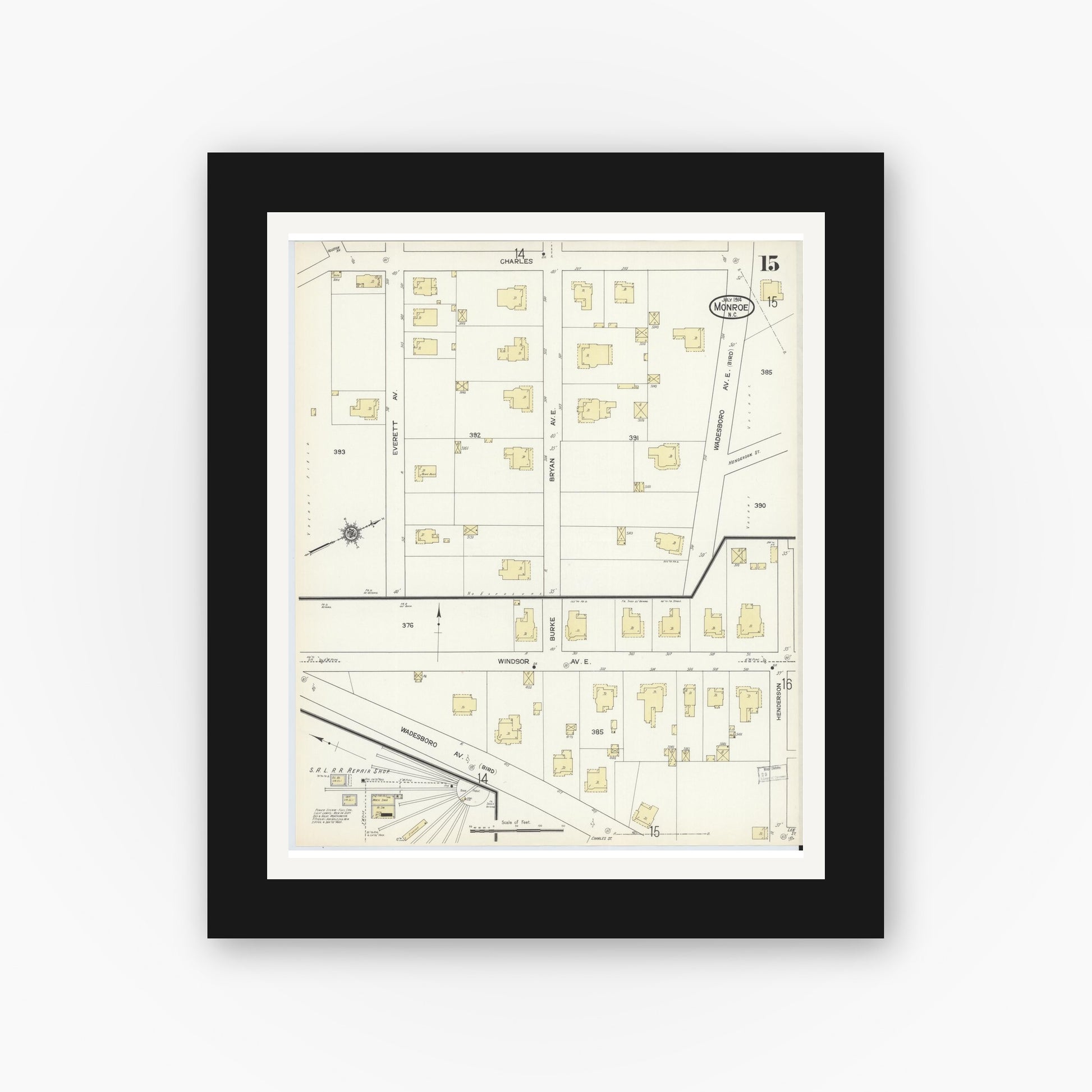 Old map wall art mockup — black gallery frame with white mat — Sanborn Fire Insurance Map from Monroe, Union County, North Carolina (1914), Sheet #0015