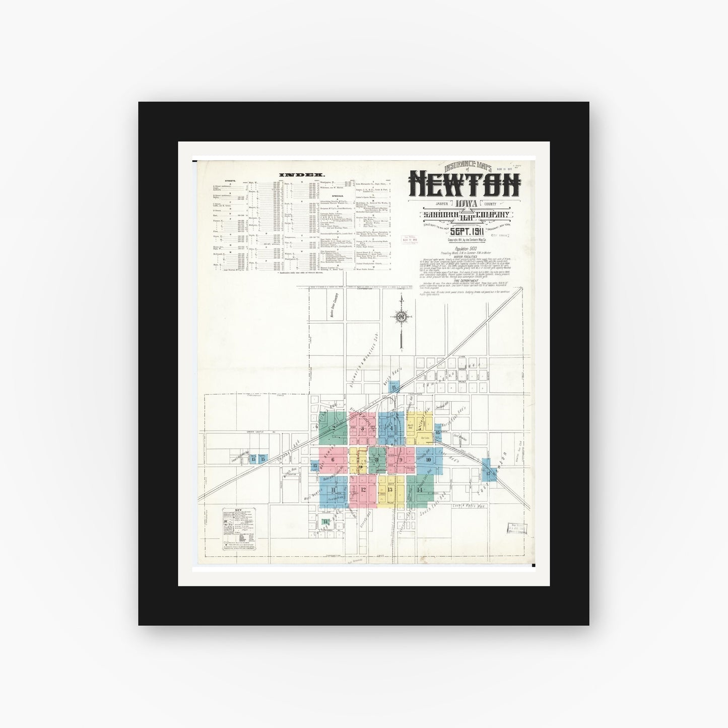 Old map wall art mockup — black gallery frame with white mat — Sanborn Fire Insurance Map from Newton, Jasper County, Iowa (1911) â€” Complete Set