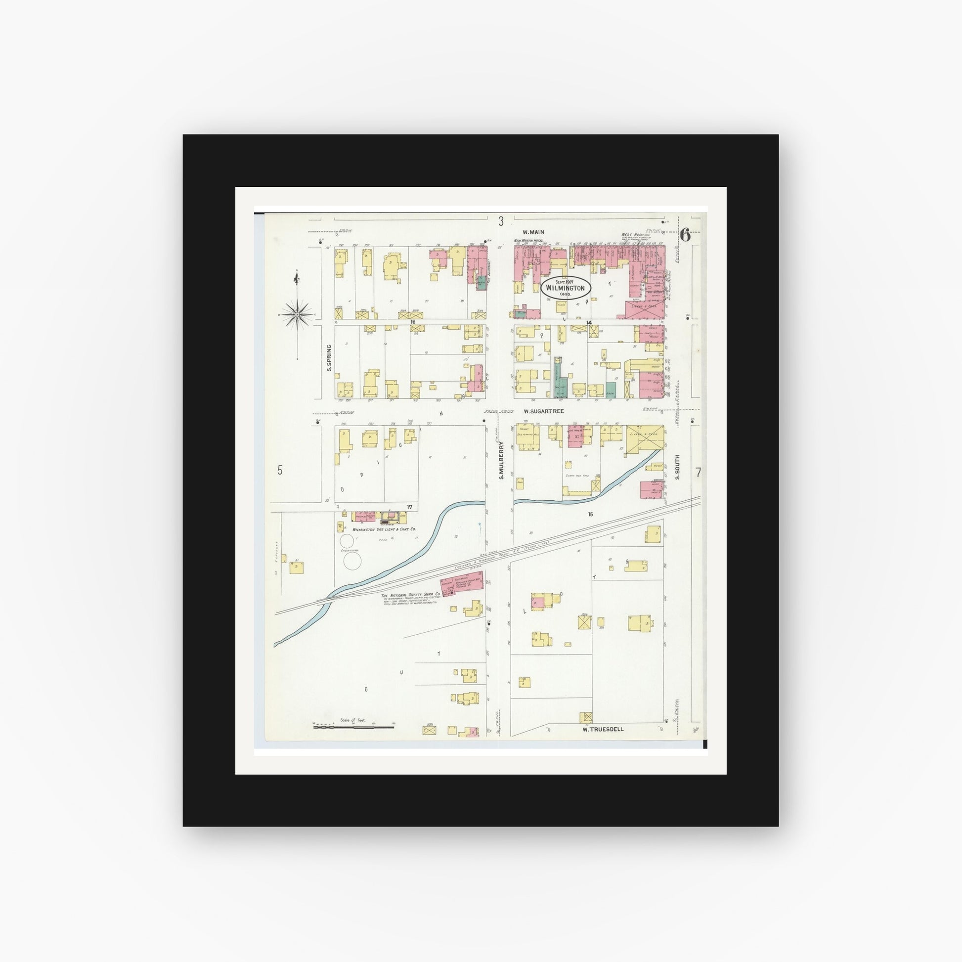 Old map wall art mockup — black gallery frame with white mat — Sanborn Fire Insurance Map from Wilmington, Clinton County, Ohio (1907), Sheet #0006