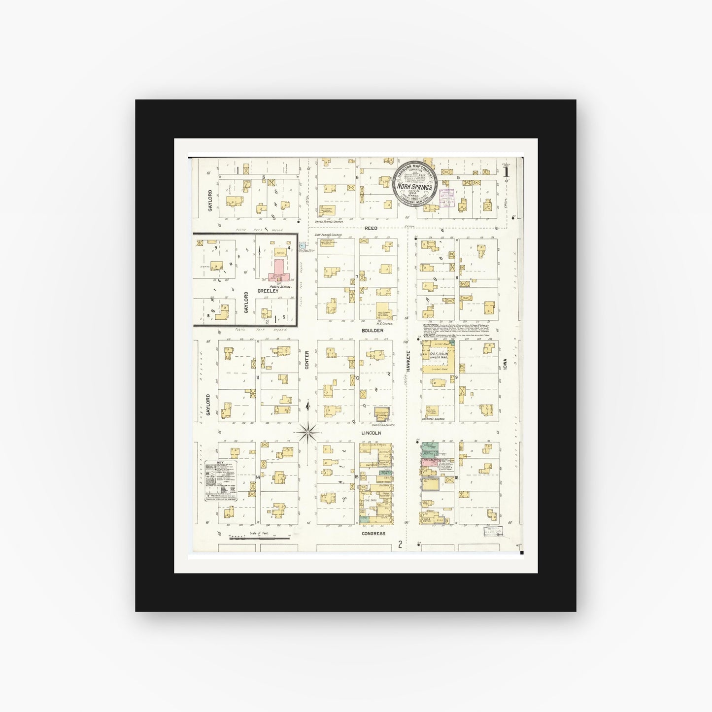 Old map wall art mockup — black gallery frame with white mat — Sanborn Fire Insurance Map from Nora Springs, Floyd County, Iowa (1902) â€” Complete Set